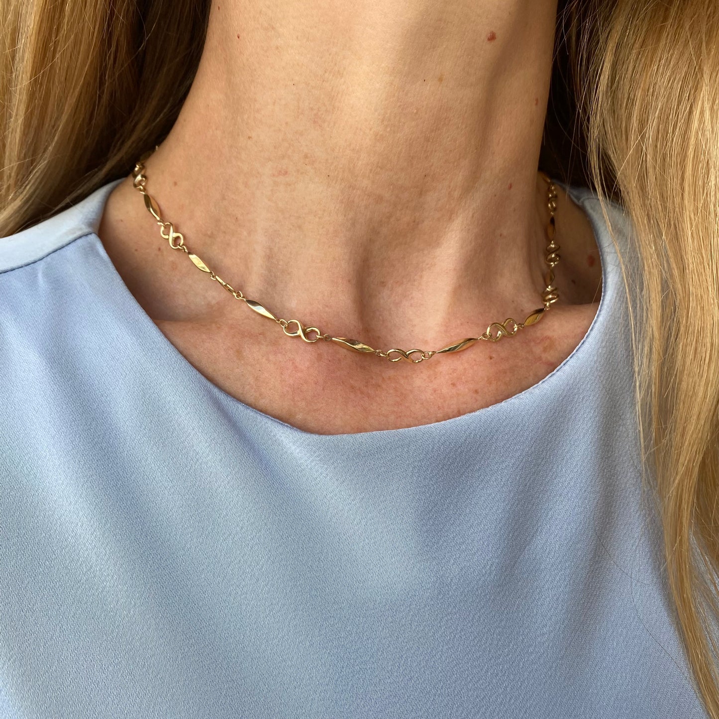 9ct gold long fancy infinity collarette necklace with intricate chain design, 44cm length, by PJD.
