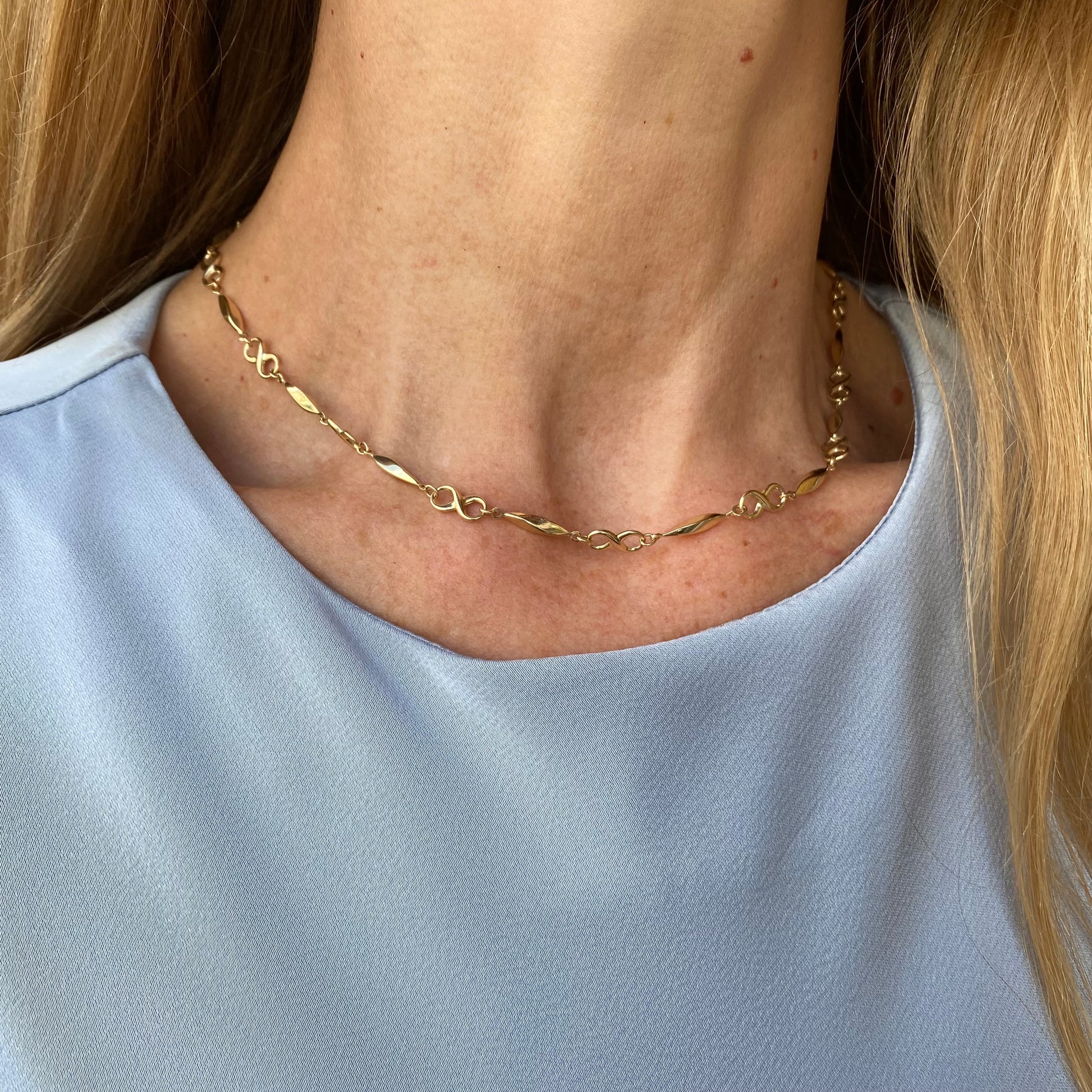 9ct gold long fancy infinity collarette necklace with intricate chain design, 44cm length, by PJD.