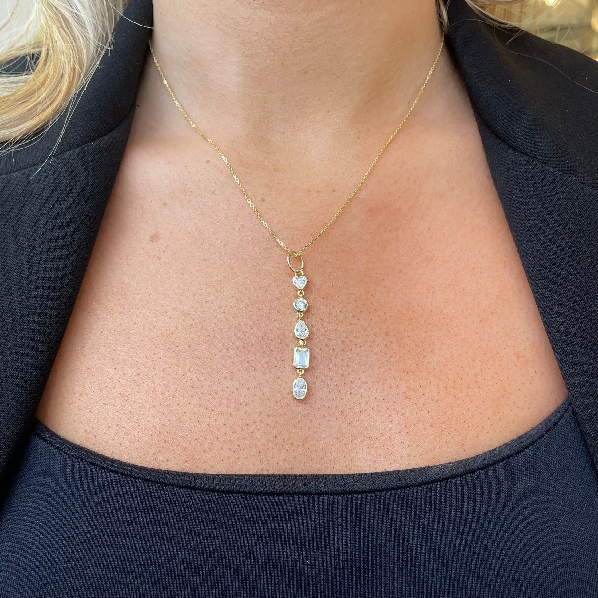 CME Sunshine Mixed CZ Drop Necklace with sparkling multi-colored cubic zirconia stones on a delicate chain.