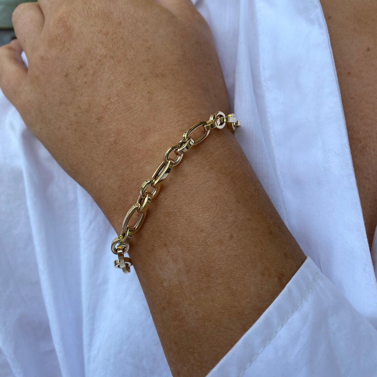 9ct gold chunky link bracelet by Mark Milton featuring bold, interconnected gold links, stylish and durable jewelry accessory.