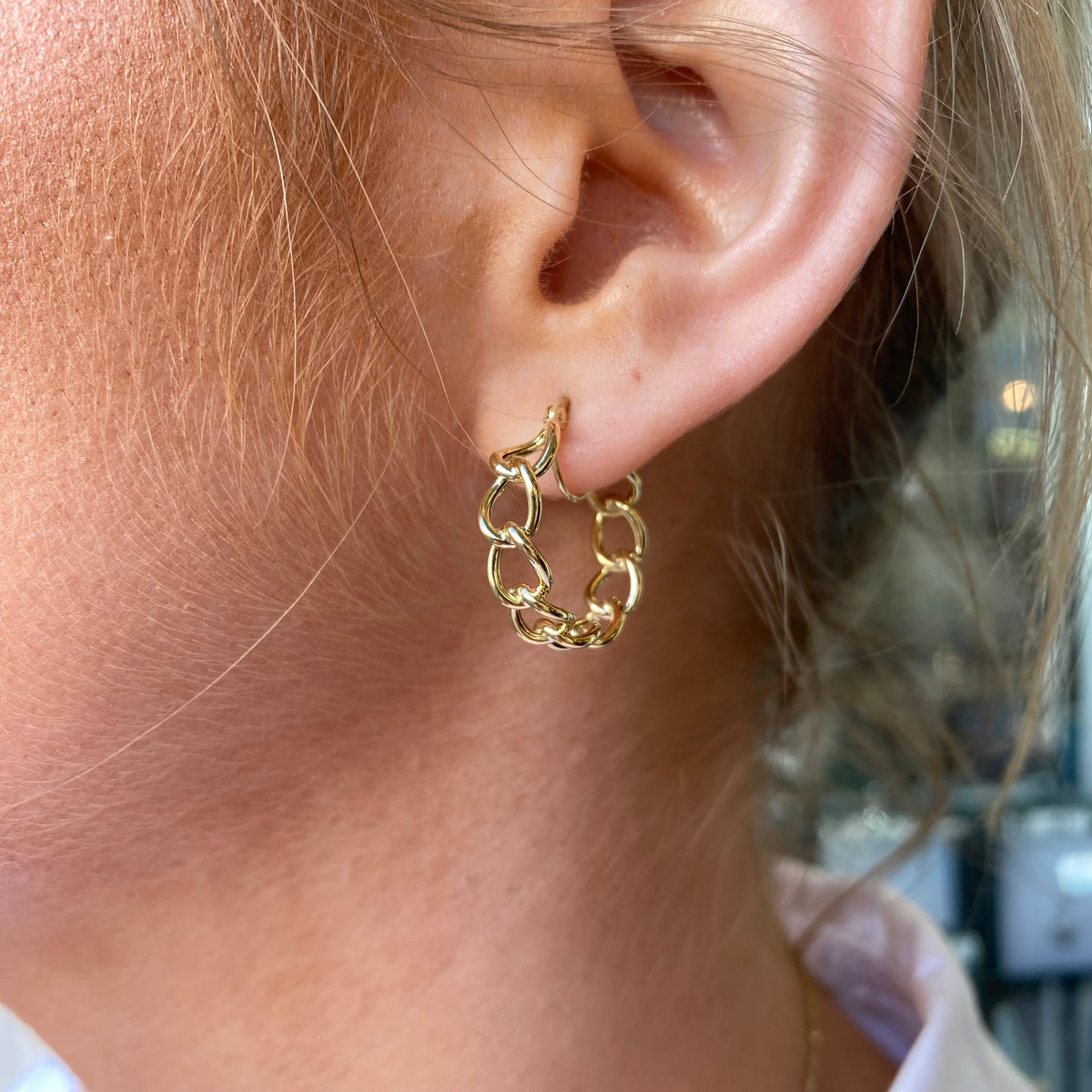 9ct gold curb link hoop earrings by Mark Milton, featuring polished gold hoops with a classic curb link design.