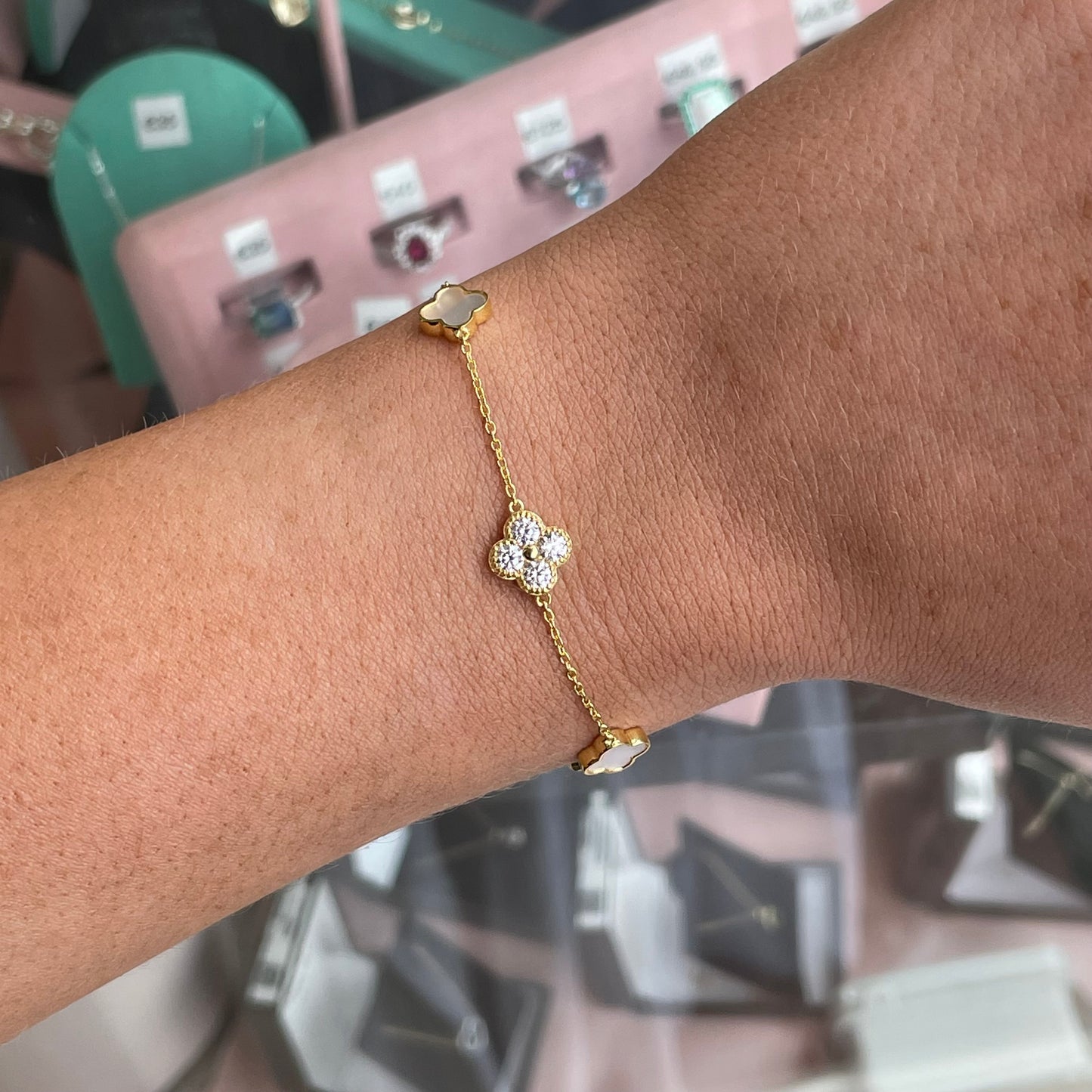 Sunshine Mother of Pearl Quatrefoil bracelet by CME featuring elegant four-leaf clover design and shimmering mother of pearl accents.