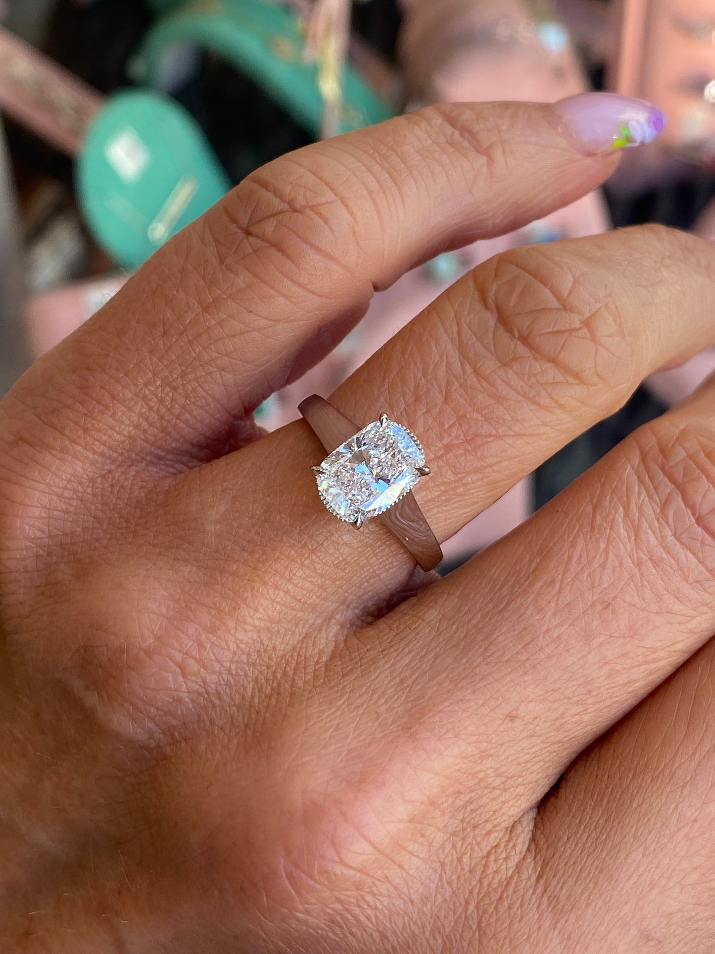 Domino platinum modified cushion solitaire engagement ring with a 2.01ct certified lab diamond, showcasing a elegant and sparkling design.