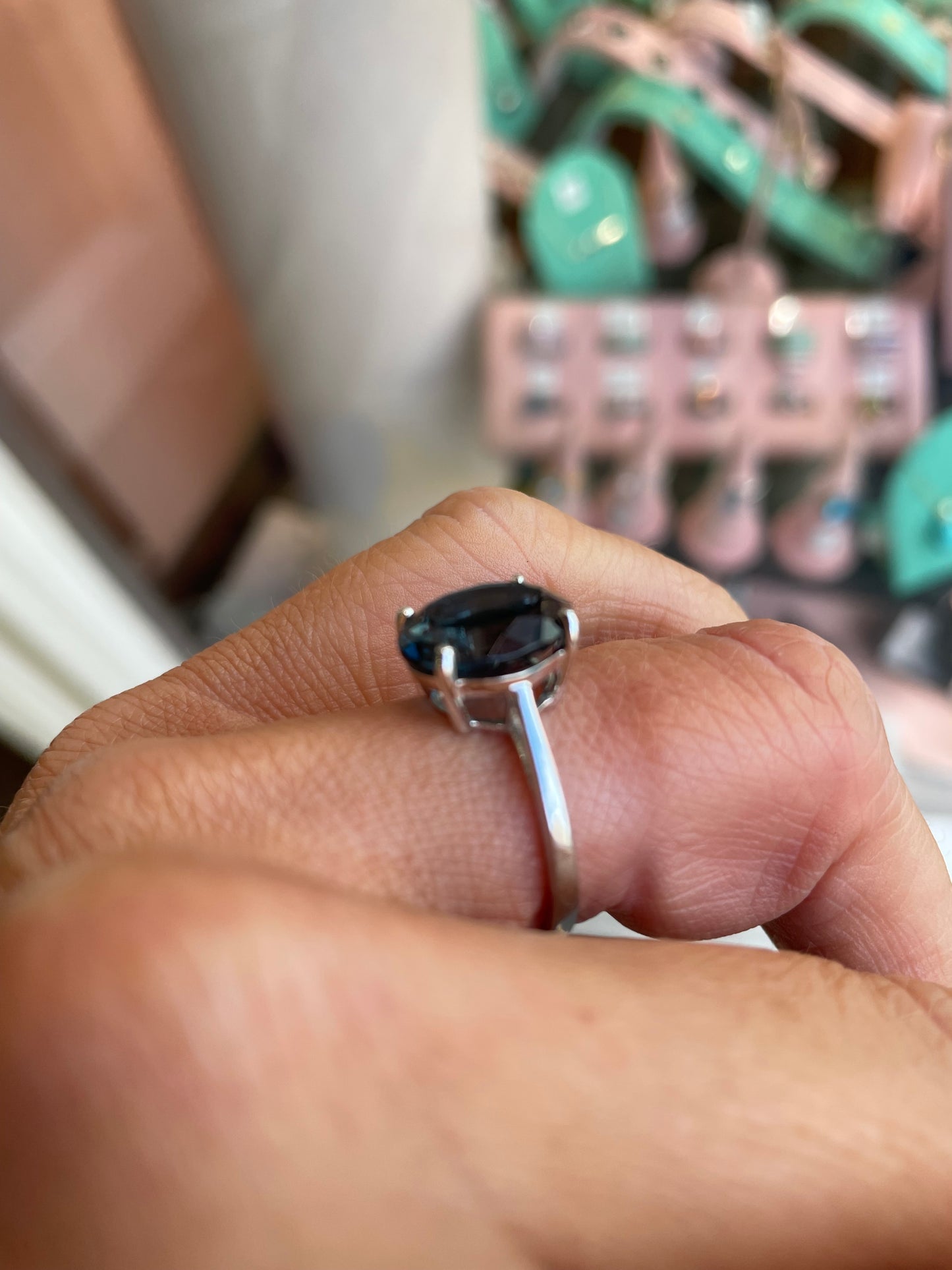 Herbert 9ct white gold oval cut London Blue Topaz ring showcasing a vibrant blue gemstone on a smooth gold band