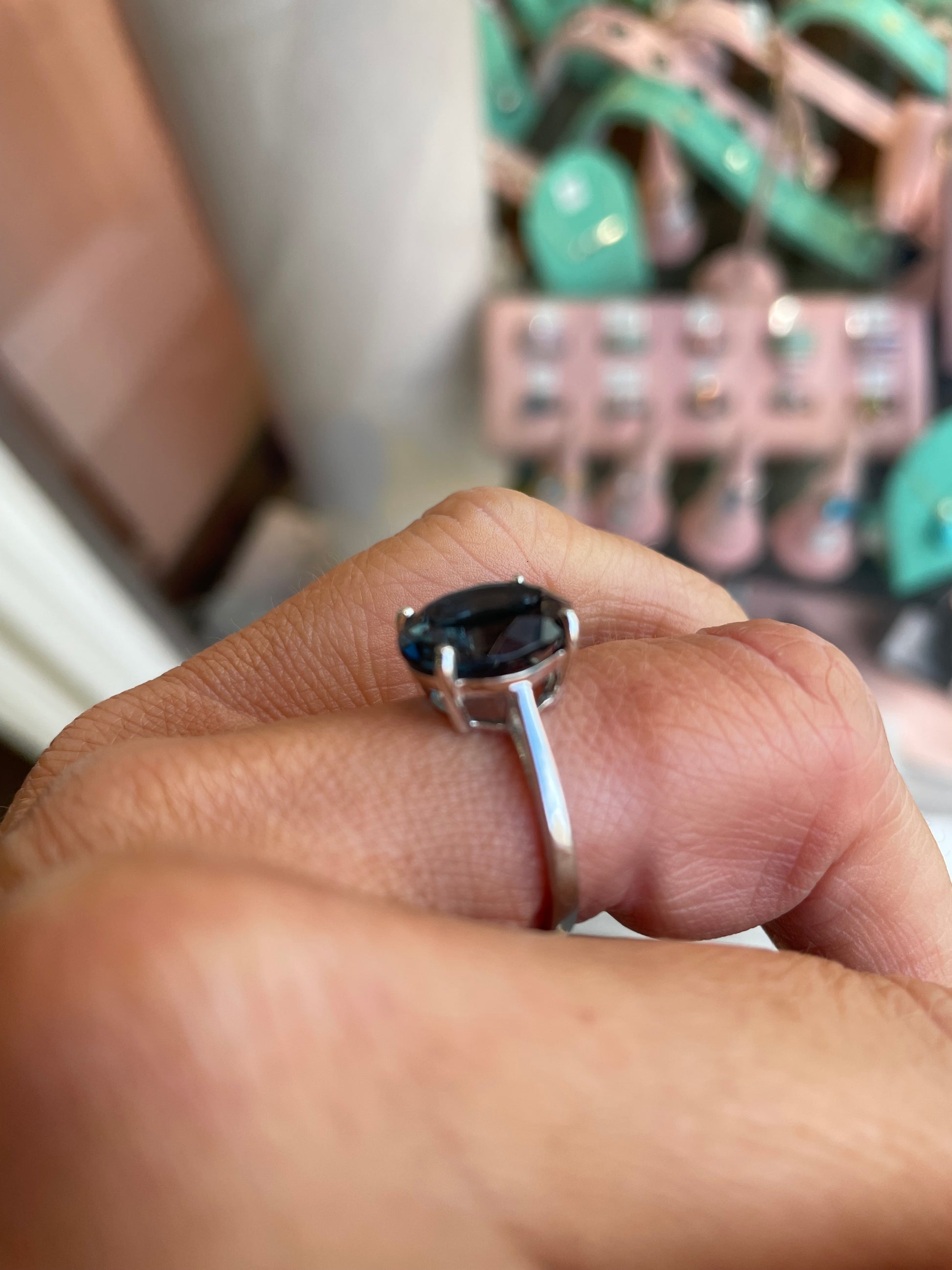 Herbert 9ct white gold oval cut London Blue Topaz ring showcasing a vibrant blue gemstone on a smooth gold band
