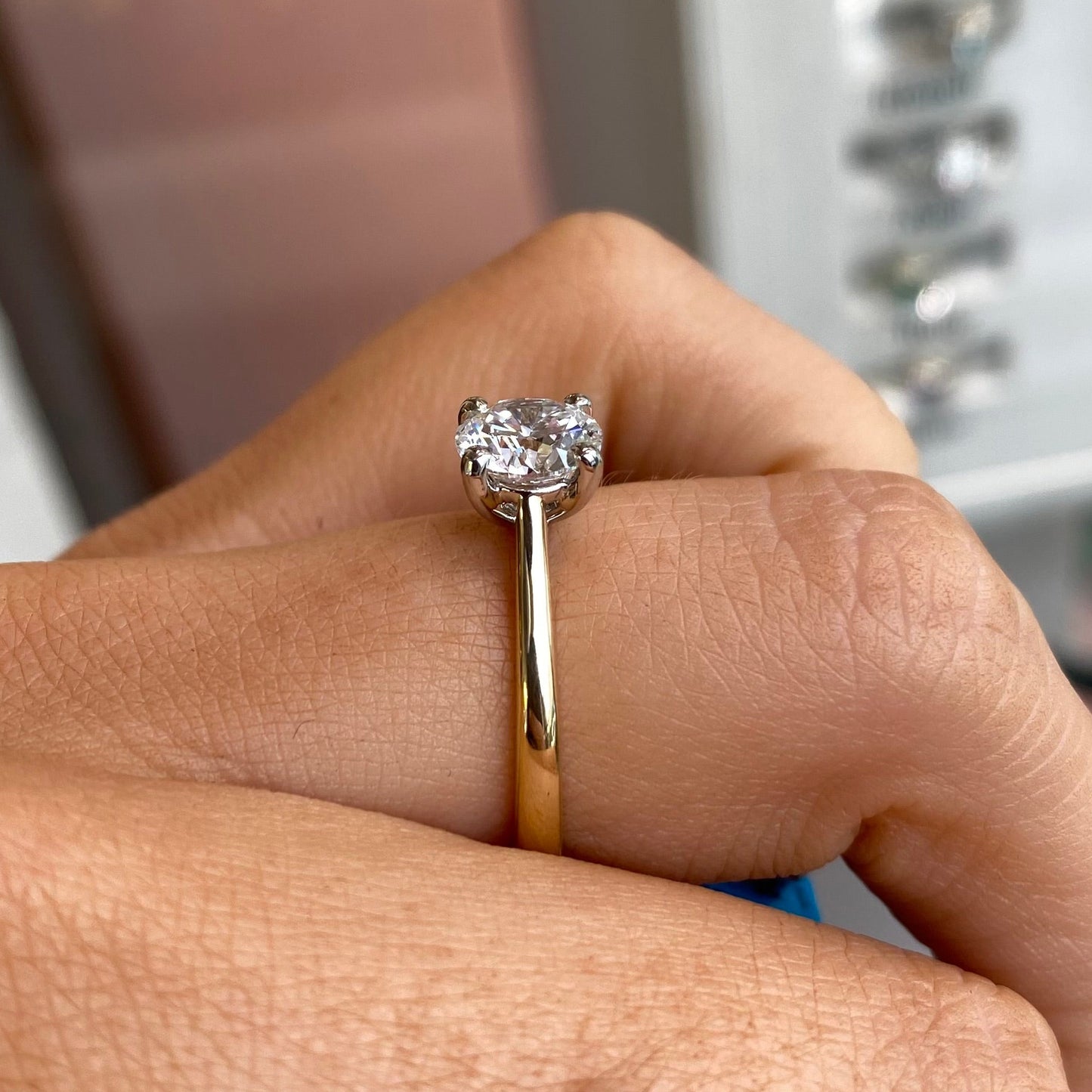 18ct gold solitaire engagement ring with a 1.26ct certificated lab diamond, featuring a sleek band and elegant setting.