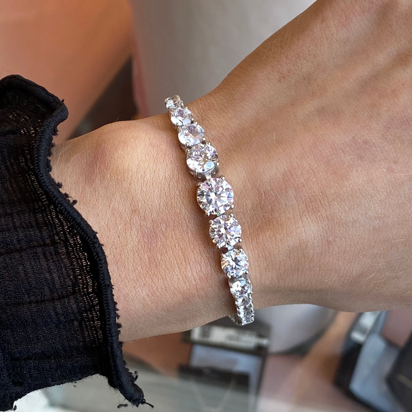 Silver Jessie bracelet by Comero, showcasing a sleek, polished silver bracelet with a modern design and minimalist style.