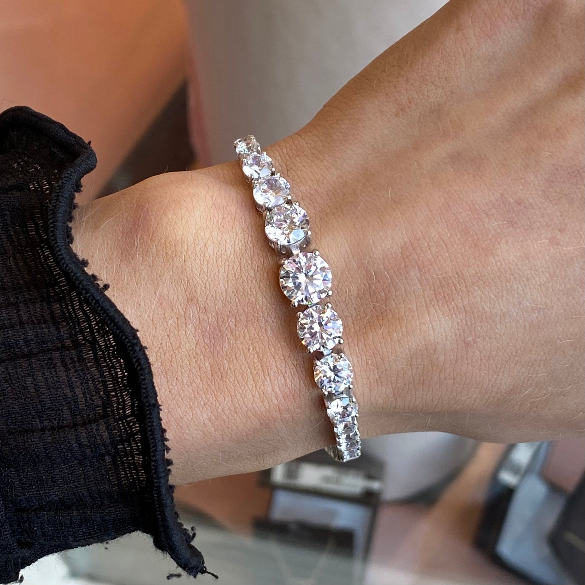 Silver Jessie bracelet by Comero, showcasing a sleek, polished silver bracelet with a modern design and minimalist style.