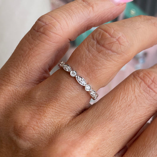 Lanza platinum diamond wedding band with 0.35ct of sparkling diamonds, decorative eternity ring design.