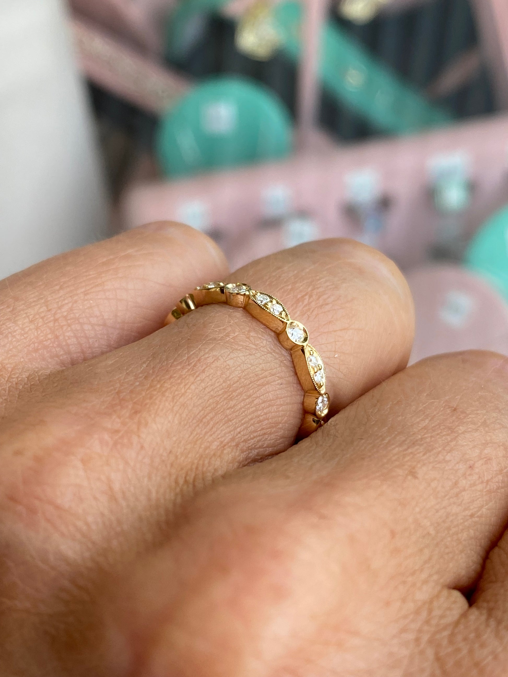 Lanza 18ct gold diamond-set wedding band with 0.35ct diamonds, featuring decorative design and elegant craftsmanship.
