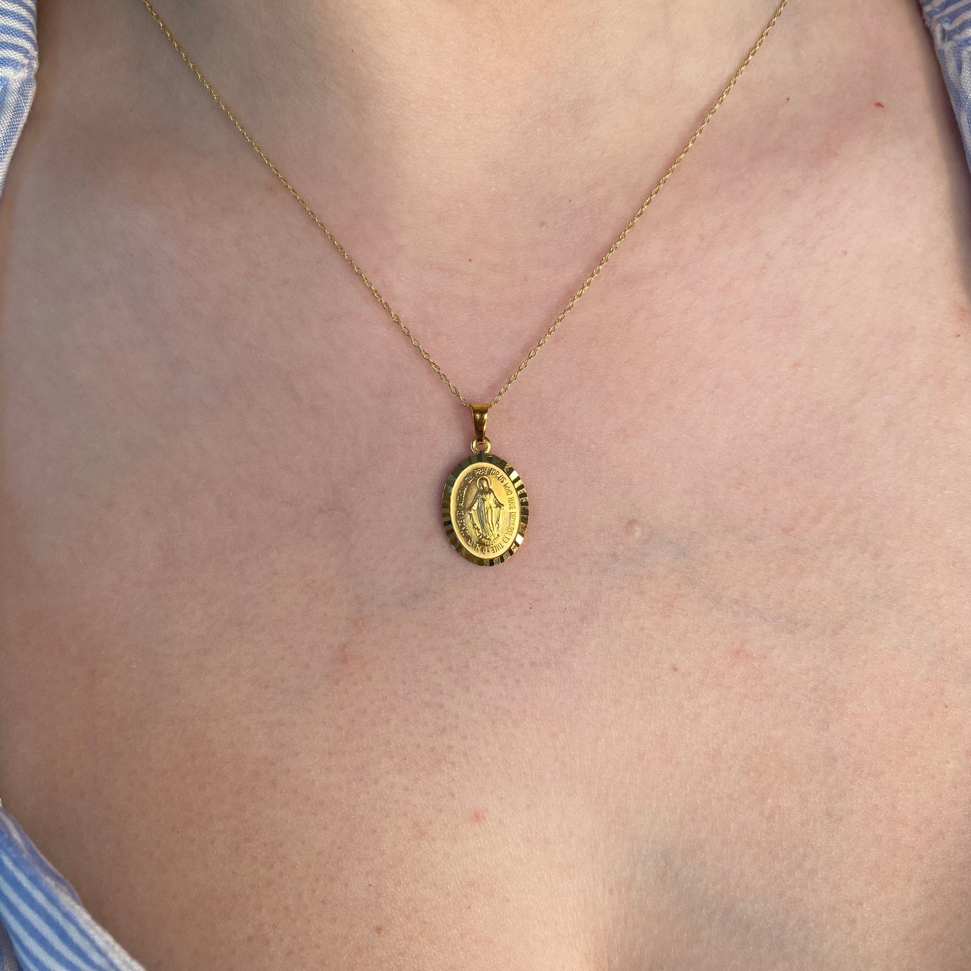 NJO 9ct gold Miraculous Medal pendant necklace with chain, medium size, featuring detailed religious medal design.
