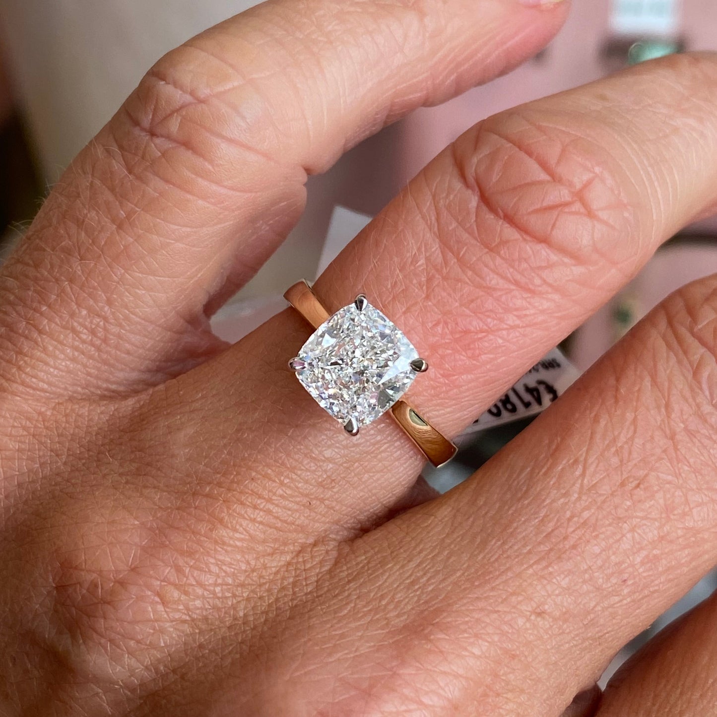 TCA 18ct gold cushion solitaire engagement ring with 3.02ct certificated lab diamond, elegant jewelry piece.