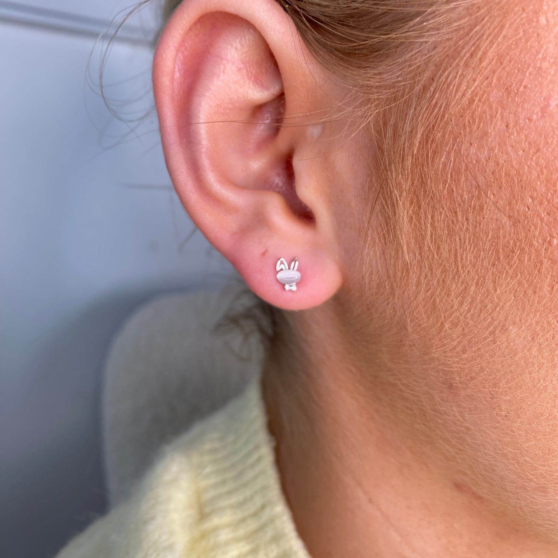 Silver CZ Bunny Stud Earrings for kids by Comero featuring cute bunny design and sparkling cubic zirconia accents.