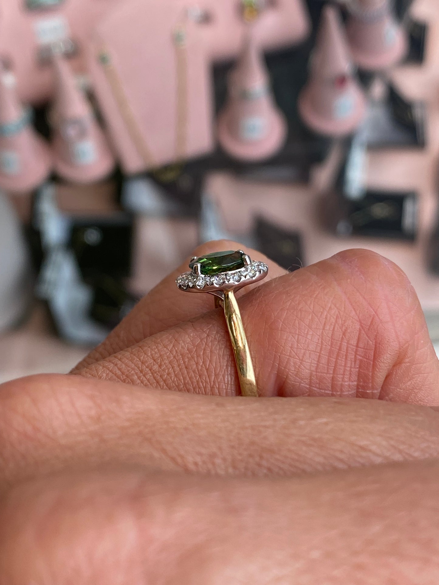 18ct gold chrome tourmaline and diamond ring by FEU, featuring a vibrant gemstone and sparkling accents in a close-up view.