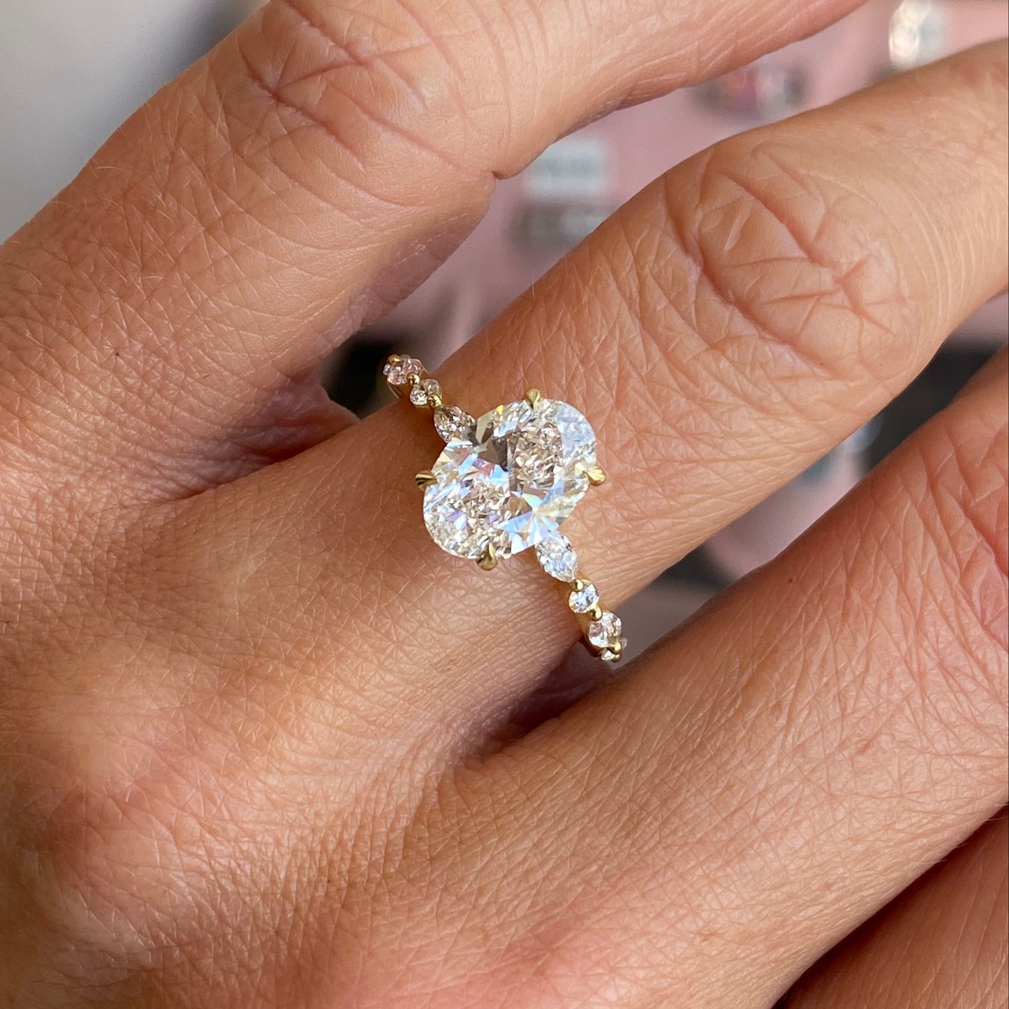 18ct gold oval solitaire engagement ring by LMJ with a 2.01ct certified lab-grown diamond, showcasing a elegant and timeless design.
