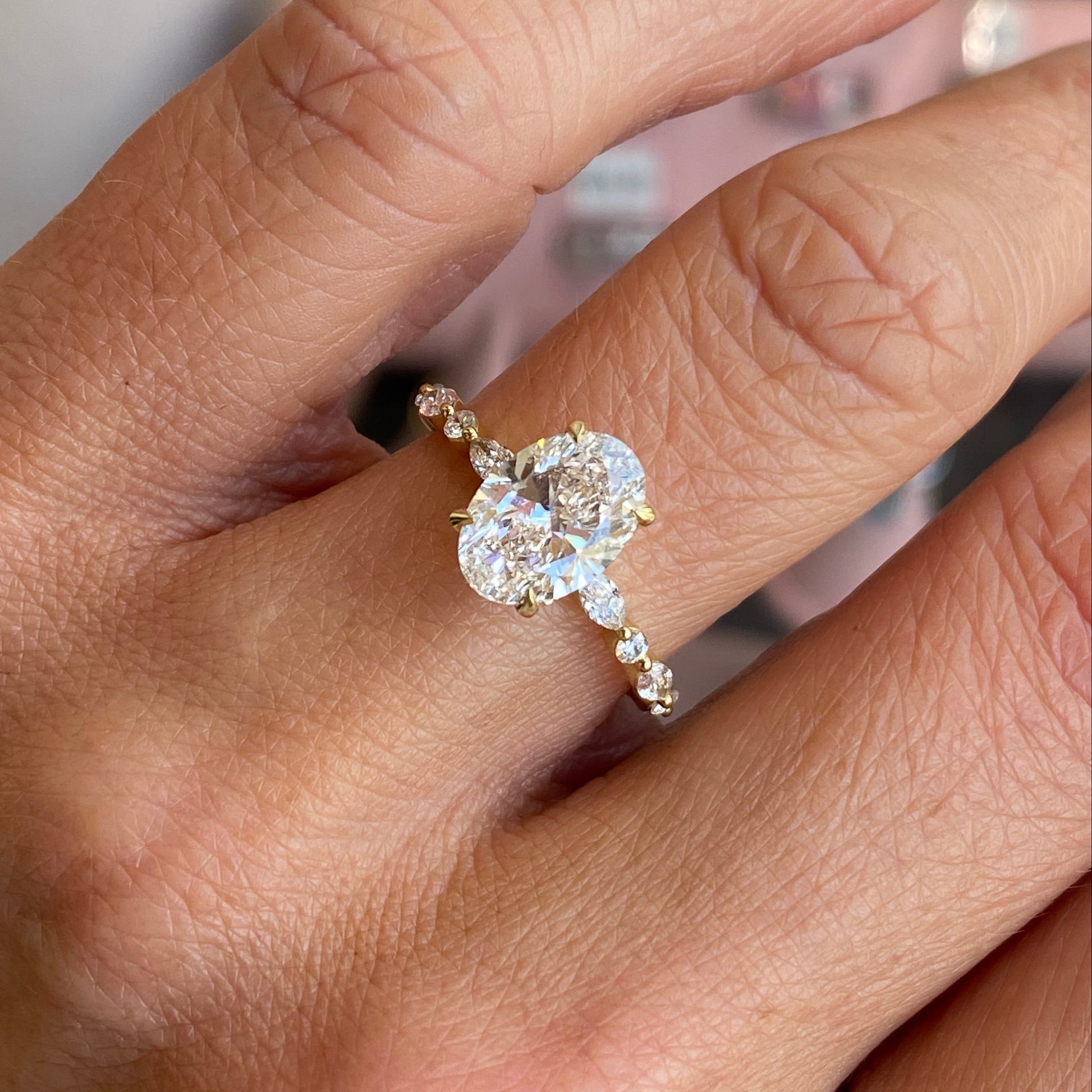 18ct gold oval solitaire engagement ring by LMJ with a 2.01ct certified lab-grown diamond, showcasing a elegant and timeless design.