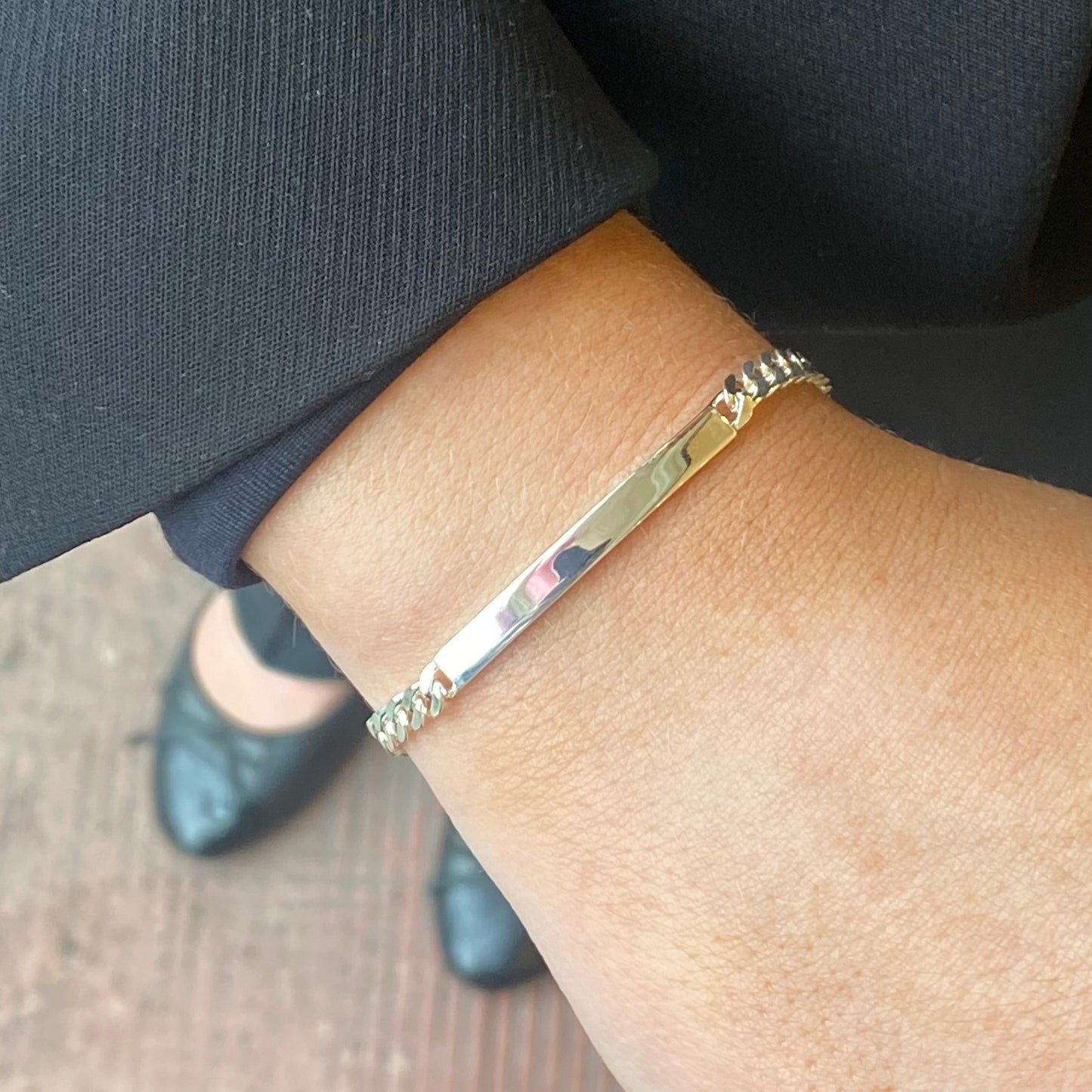 Silver Insignia identity bracelet, 19cm length, featuring a sleek design with engraved details and secure clasp.