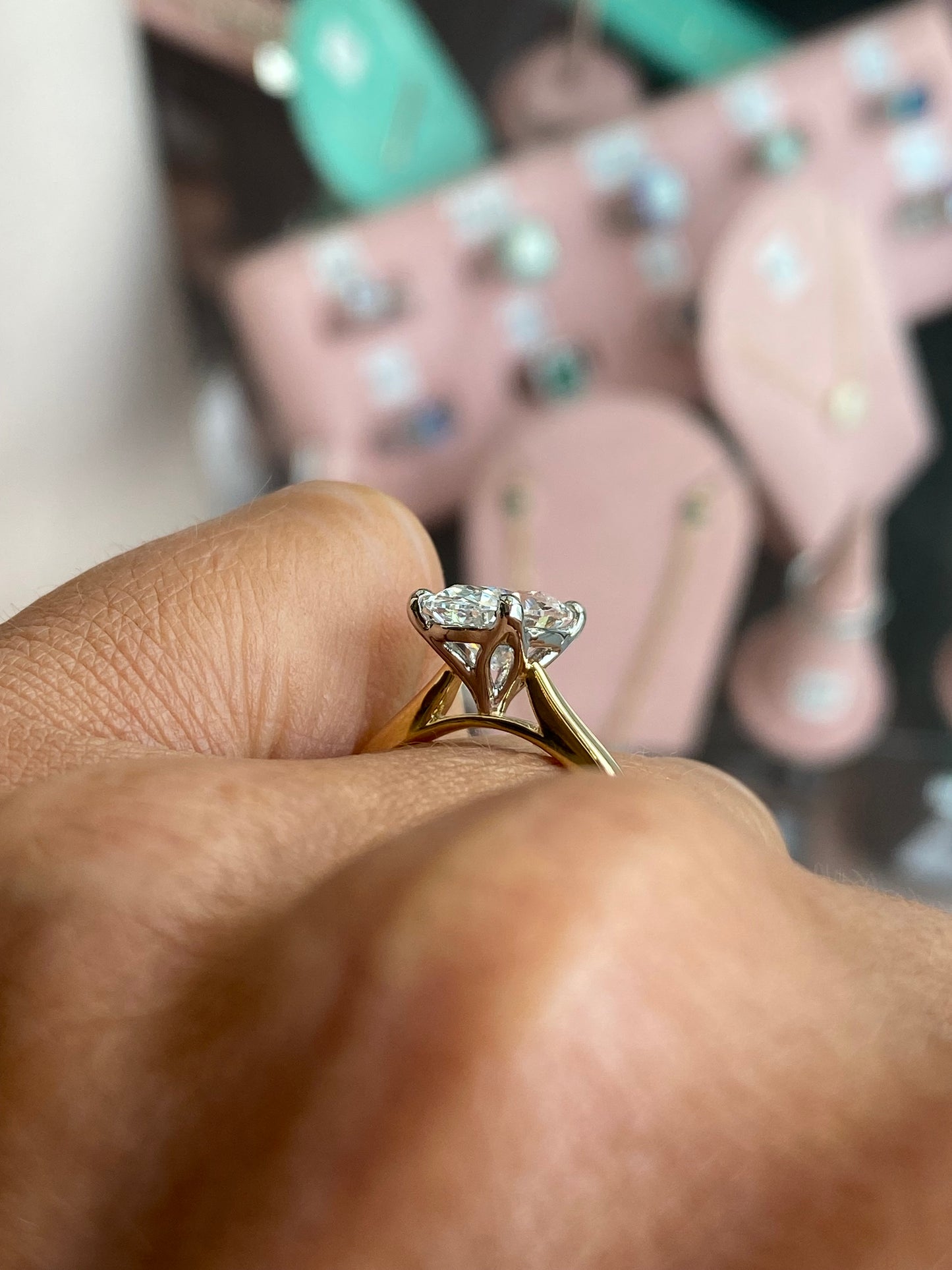 Prima 18ct gold oval solitaire engagement ring with a 2.30ct certified diamond, showcasing a sleek and elegant design.