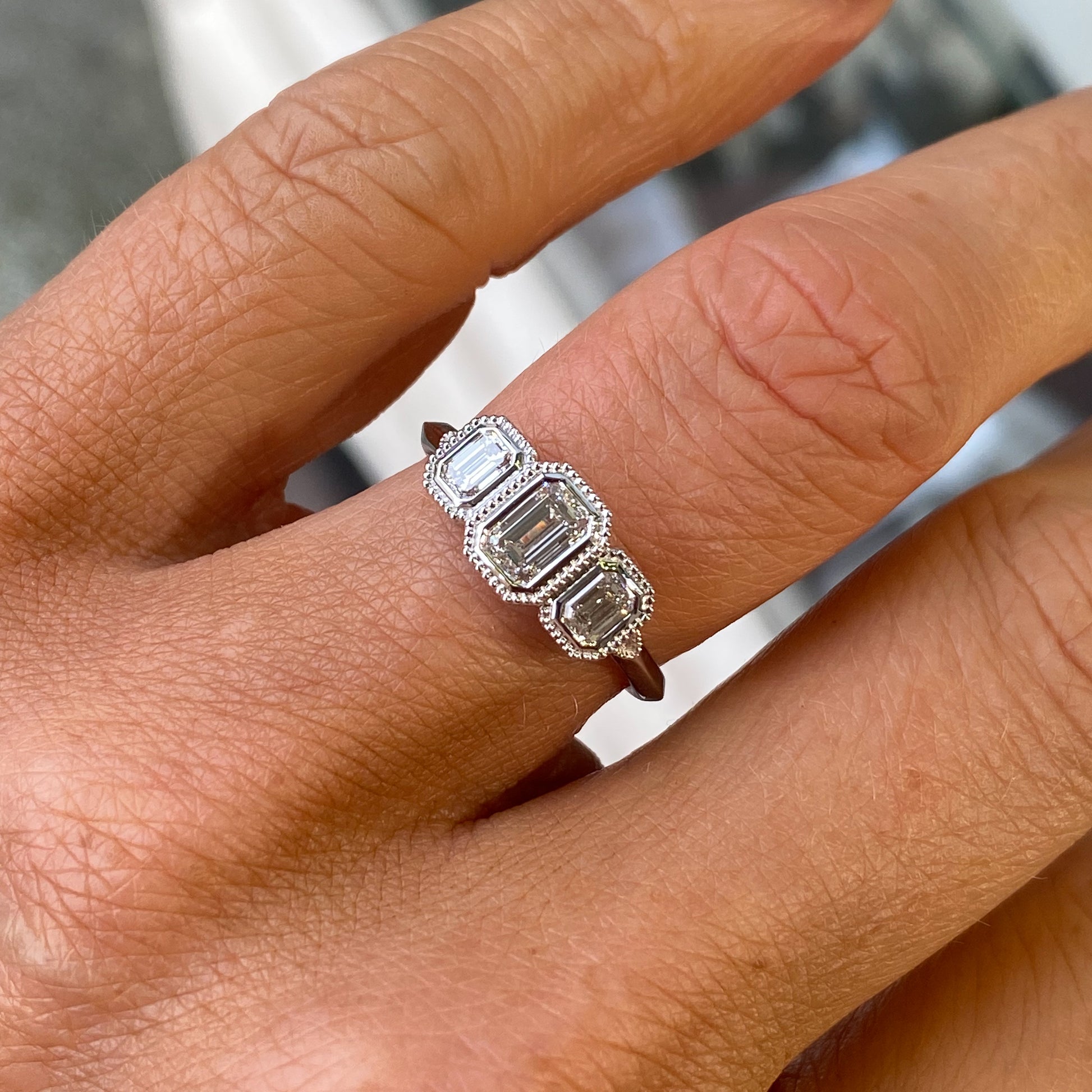 18ct White Gold Emerald Cut Diamond Trilogy Engagement Ring John