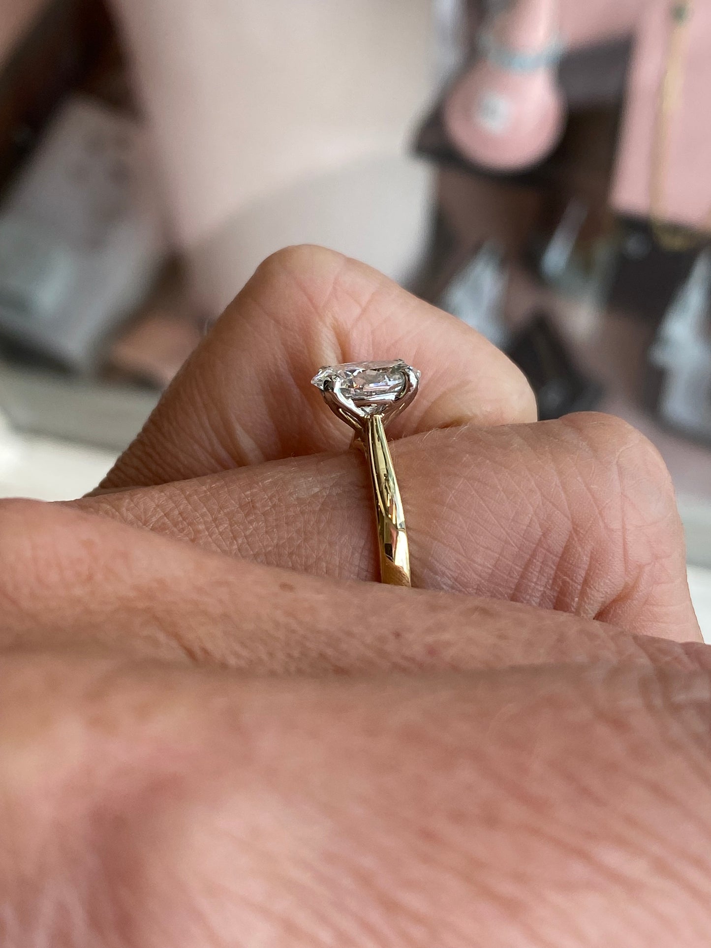 Prima 18ct gold oval solitaire engagement ring with a 1.51ct certified diamond, showcasing a classic and elegant design.