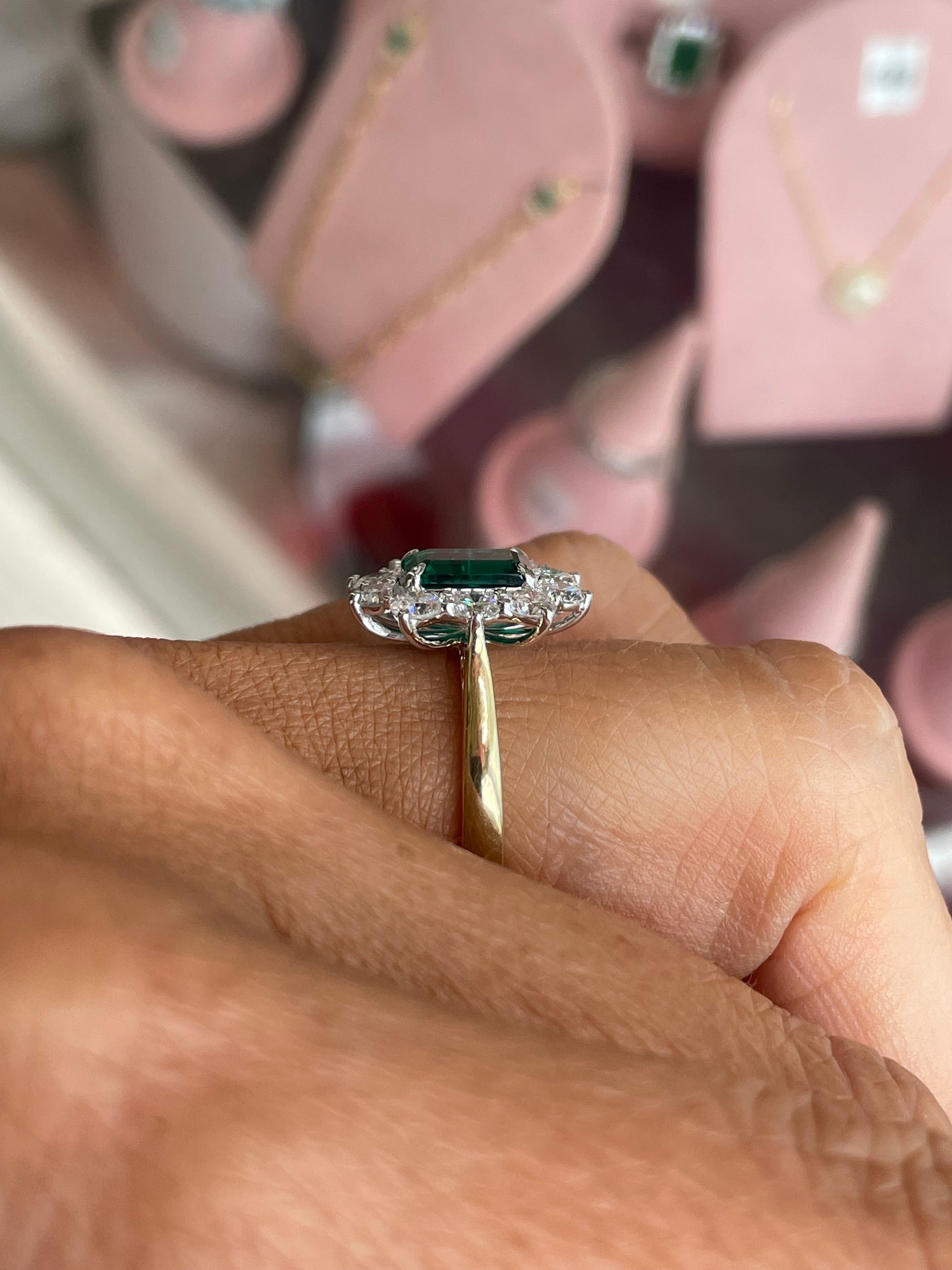 9ct gold lab-grown emerald cluster ring featuring a vibrant emerald gemstone cluster on a sleek gold band.