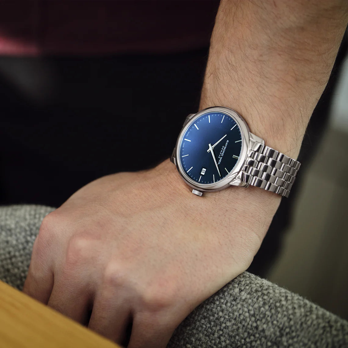 Raymond Weil Classic Toccata 39mm steel watch with blue dial and silver-tone hands, featuring a sleek and elegant design.