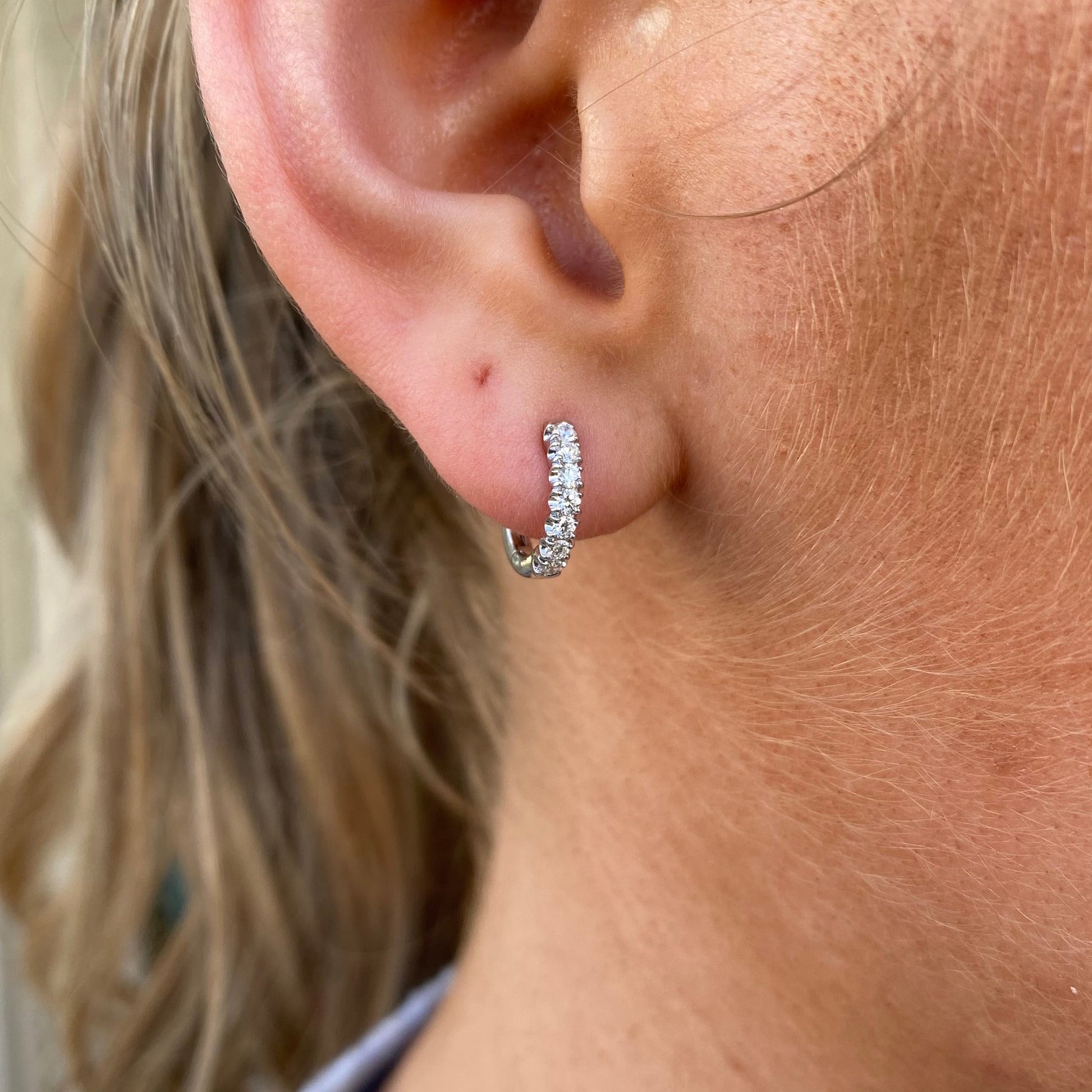 Lanza 18ct white gold diamond hoop earrings with 0.29ct diamonds, showcasing elegant circular jewelry design.