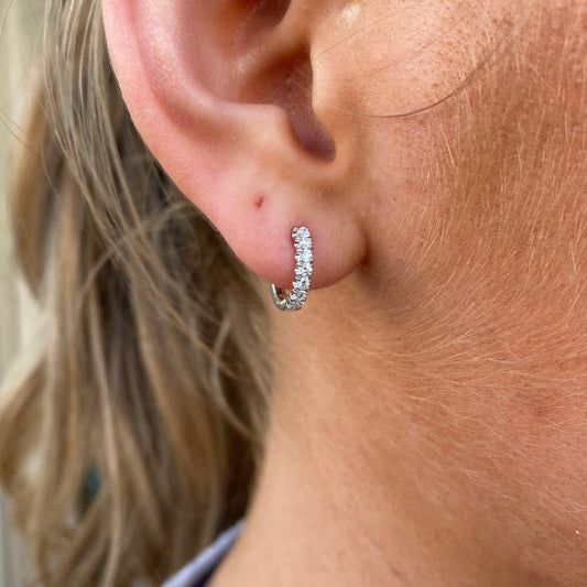 Lanza 18ct white gold diamond hoop earrings with 0.29ct diamonds, showcasing elegant circular jewelry design.