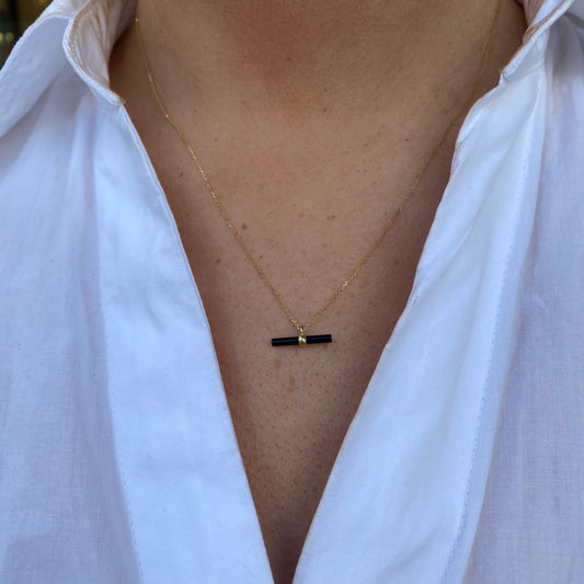 9ct gold onyx T-bar necklace by Mark Milton, featuring a sleek black onyx pendant on a delicate gold chain.