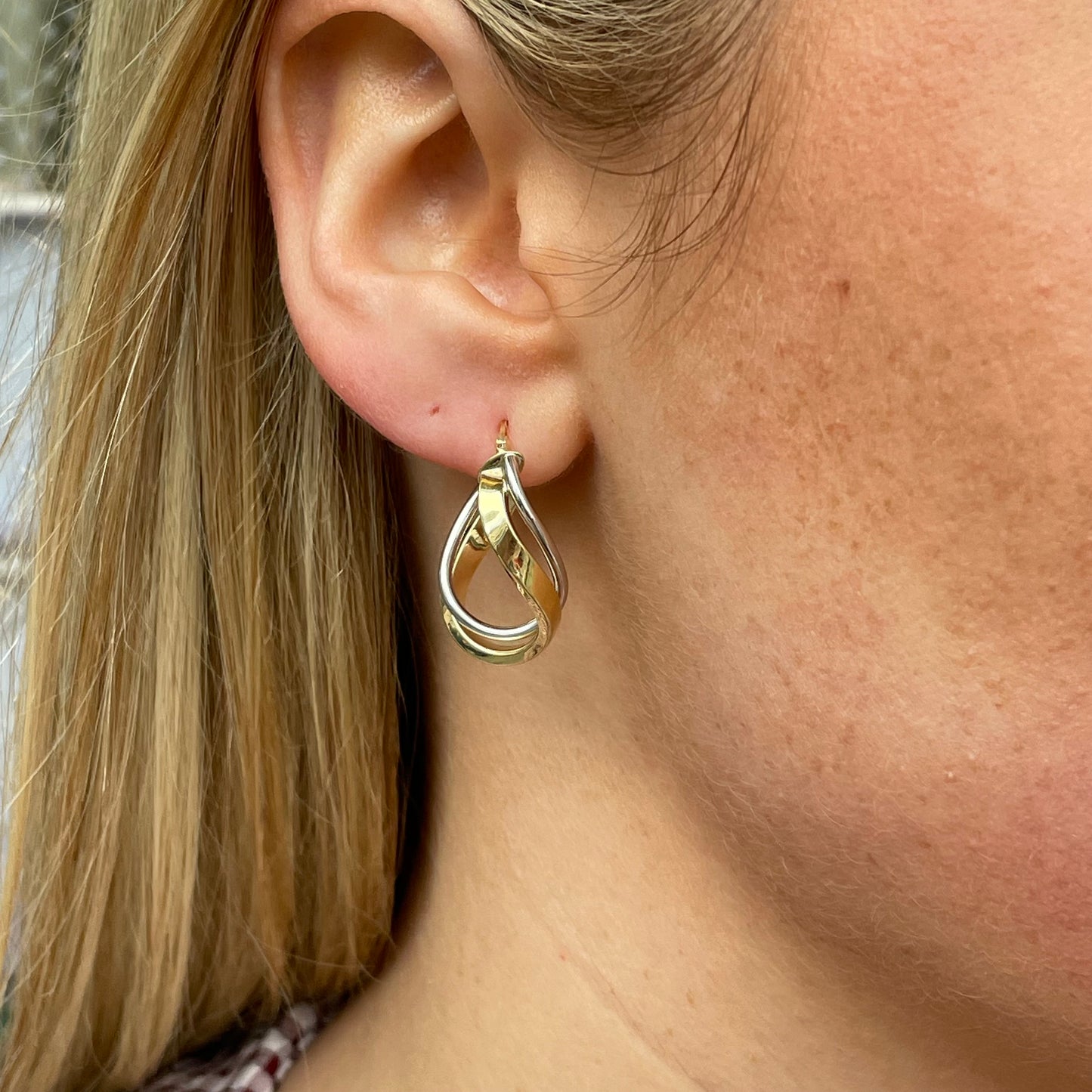 9ct gold two-tone swirl hoop earrings by Mark Milton, featuring a stylish twisted design and polished finish.