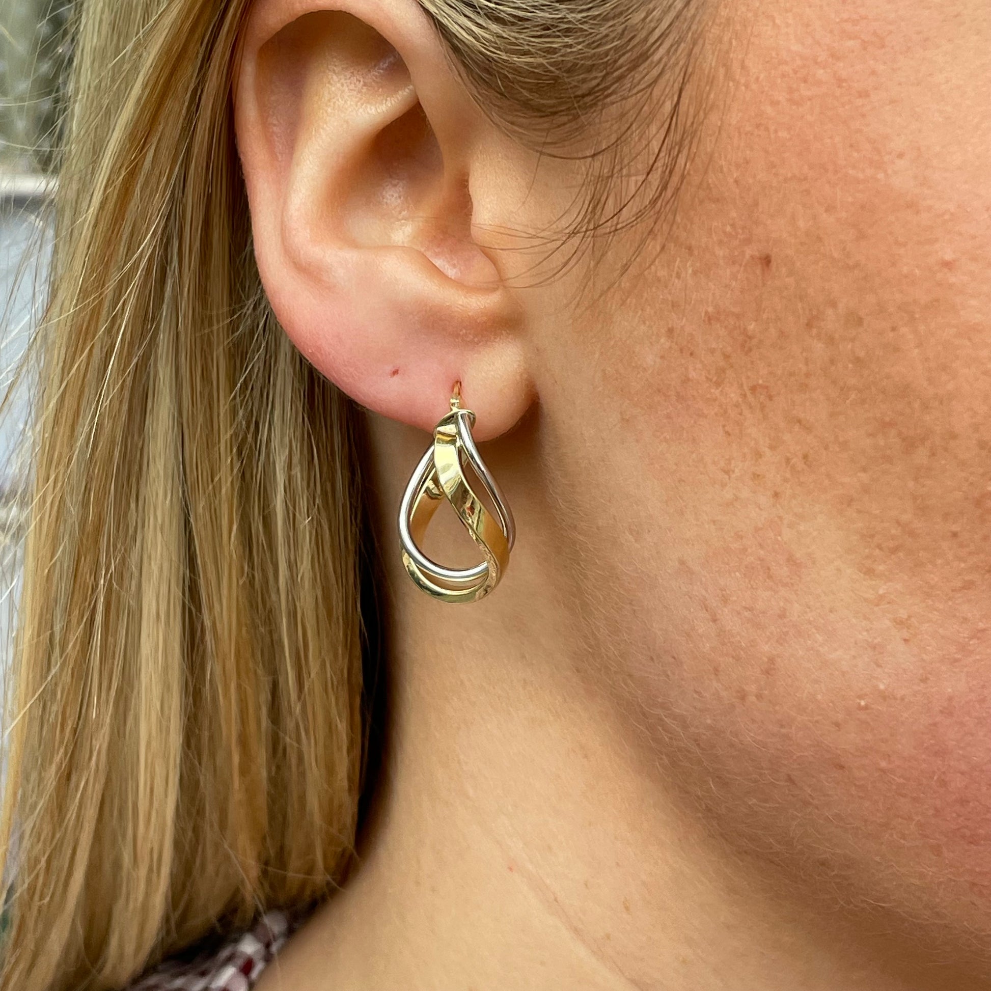 9ct gold two-tone swirl hoop earrings by Mark Milton, featuring a stylish twisted design and polished finish.