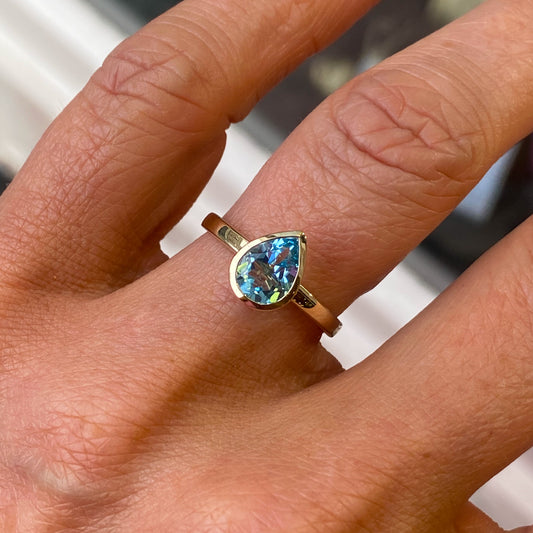 9ct Gold Bezel Pear Ring - Blue Topaz