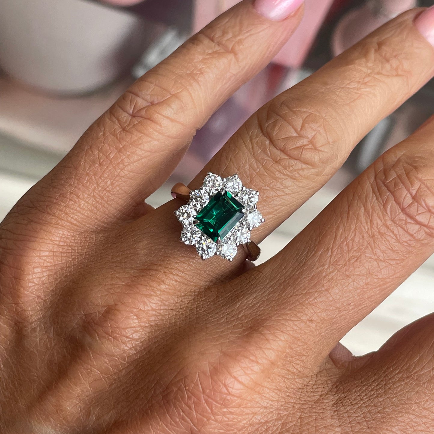 9ct gold lab-grown emerald cluster ring featuring a vibrant green gemstone design, crafted by TCA.