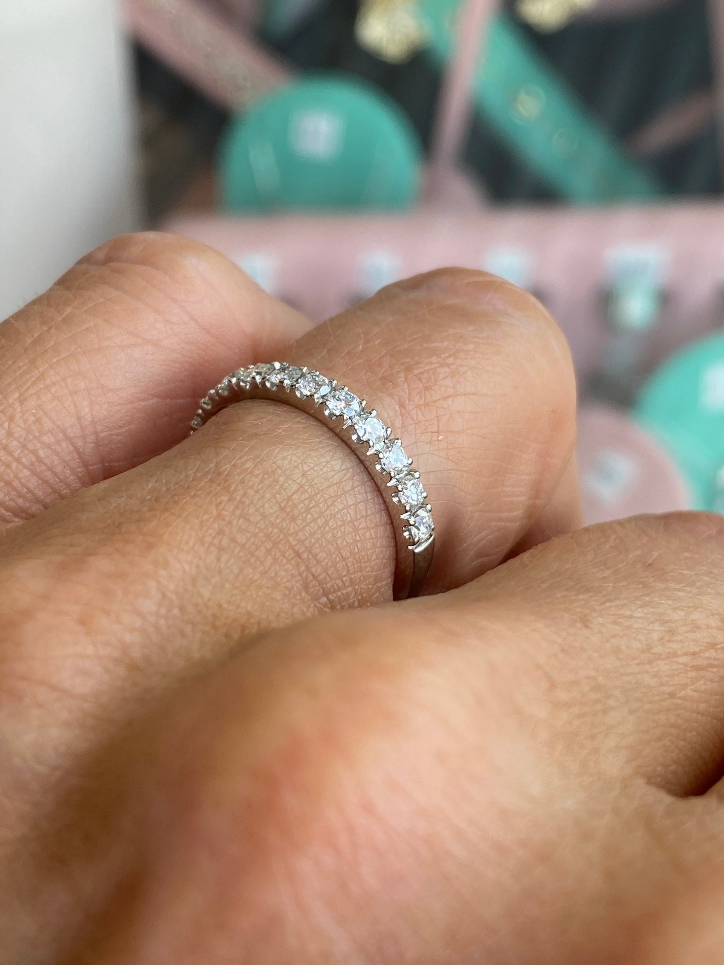 Lanza platinum diamond wedding band with 0.50ct eternity diamonds, showcasing a sleek, polished ring design with sparkling stones.