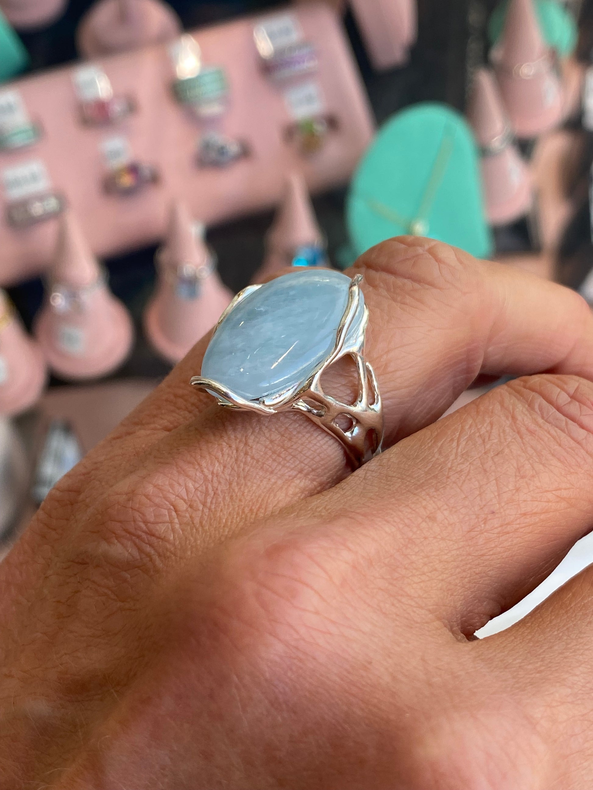 Silver silky aquamarine nugget ring by Bruno featuring a smooth, polished aquamarine stone set in a sleek silver band.
