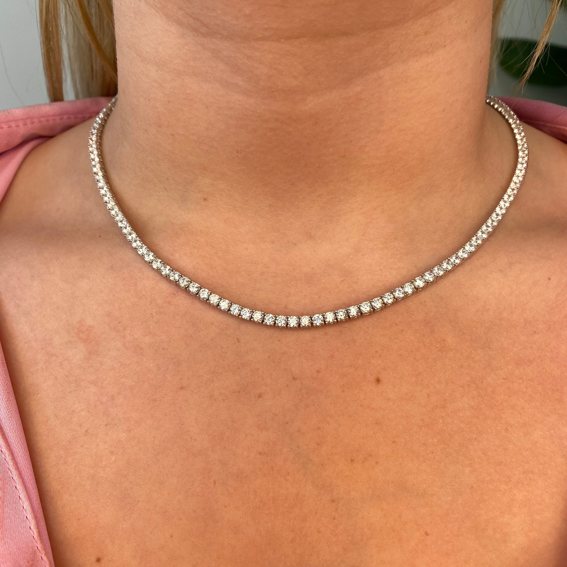 Silver Trisha Necklace by Comero featuring a delicate chain and elegant pendant.