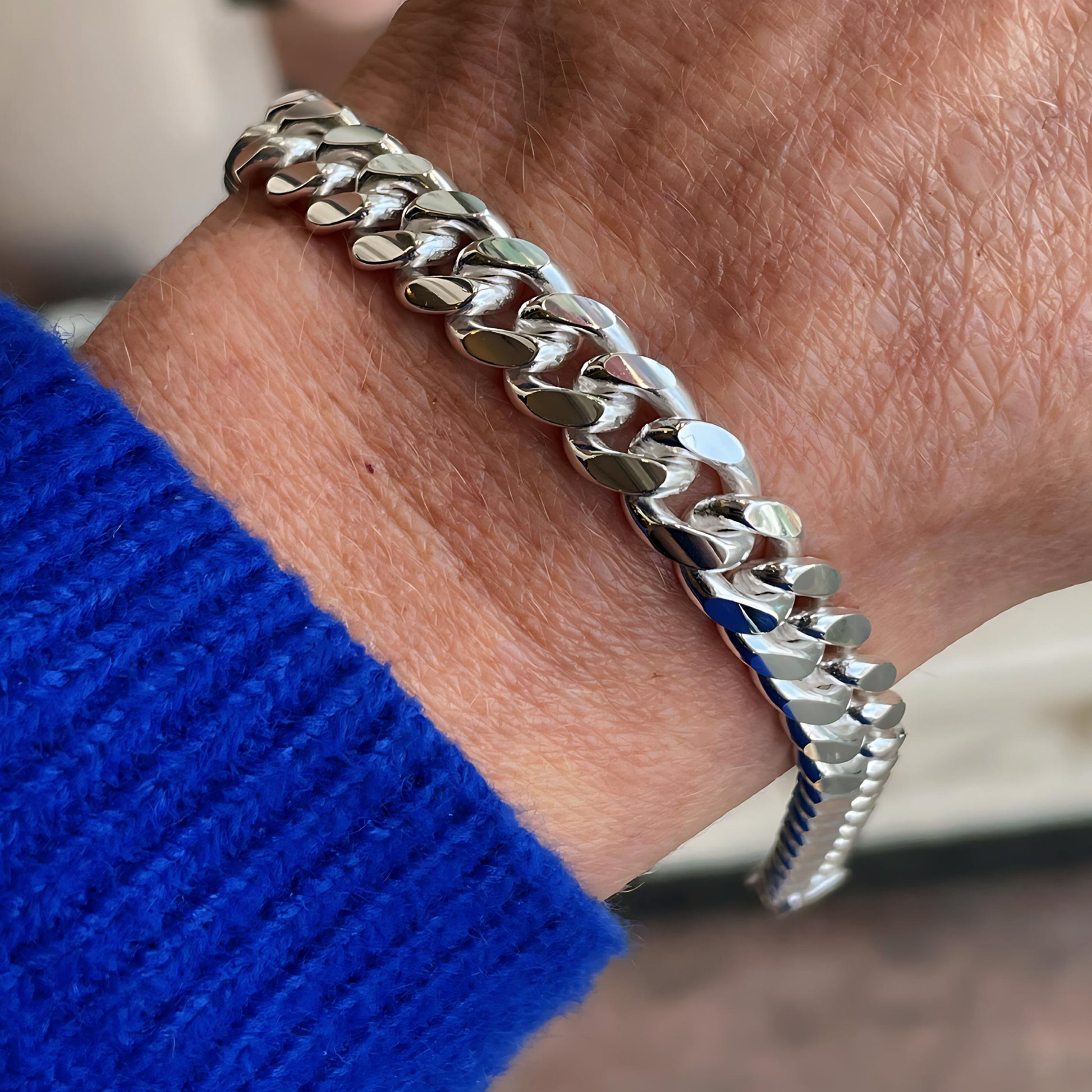 Silver chunky solid curb bracelet by Insignia, 20cm length, featuring bold interconnected curb links on a plain background.