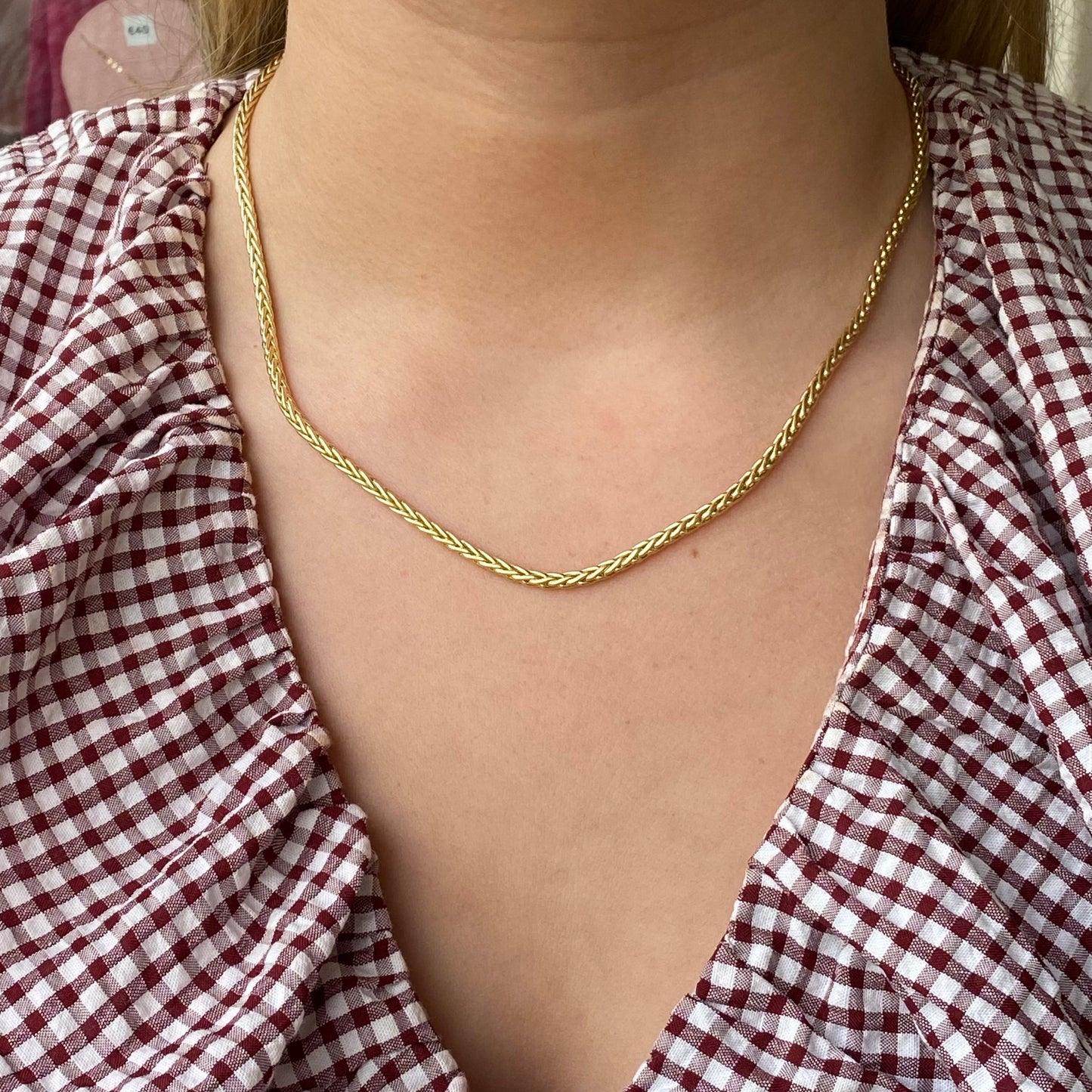 9ct gold Palmier necklace by Mark Milton featuring a detailed palm leaf pendant on a sleek chain.