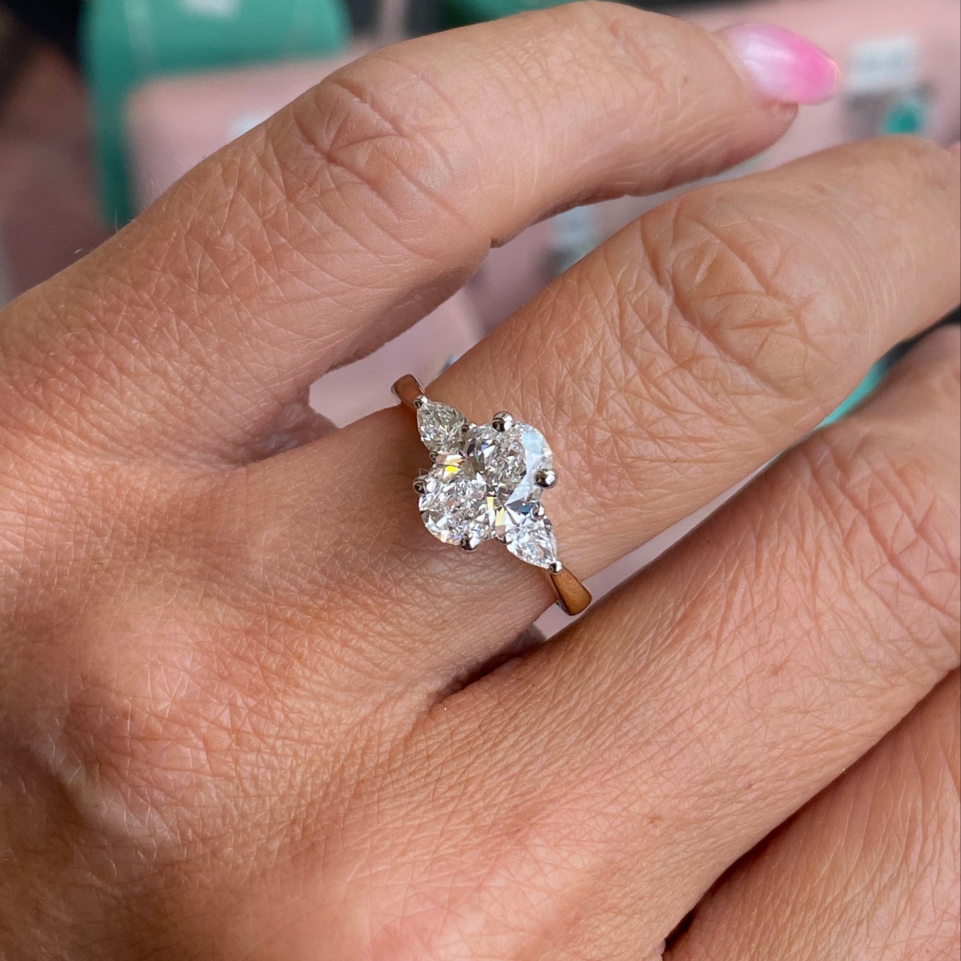 18ct gold trilogy engagement ring with certificated 1.84ct lab-grown diamonds, crafted by Prima, showcasing three sparkling stones.