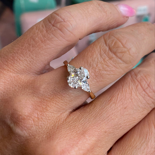 18ct gold trilogy engagement ring with certificated 1.84ct lab-grown diamonds, crafted by Prima, showcasing three sparkling stones.