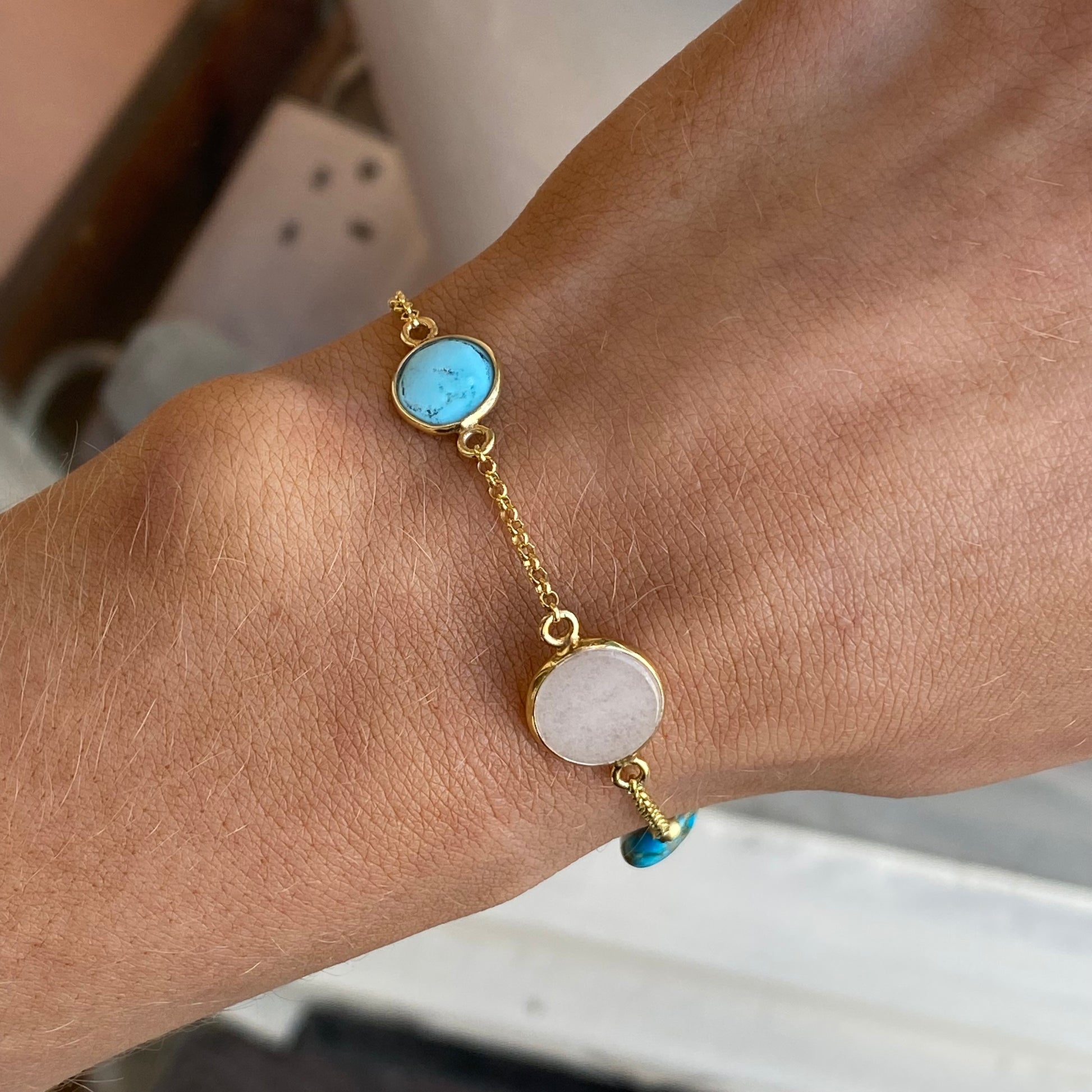Bruno turquoise, pearl, and mother of pearl bracelet with a beaded design featuring vibrant stones and elegant accents.