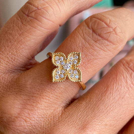 18ct gold Venetian quatrefoil diamond ring by Lanza featuring intricate design and sparkling diamonds on a luxurious band.