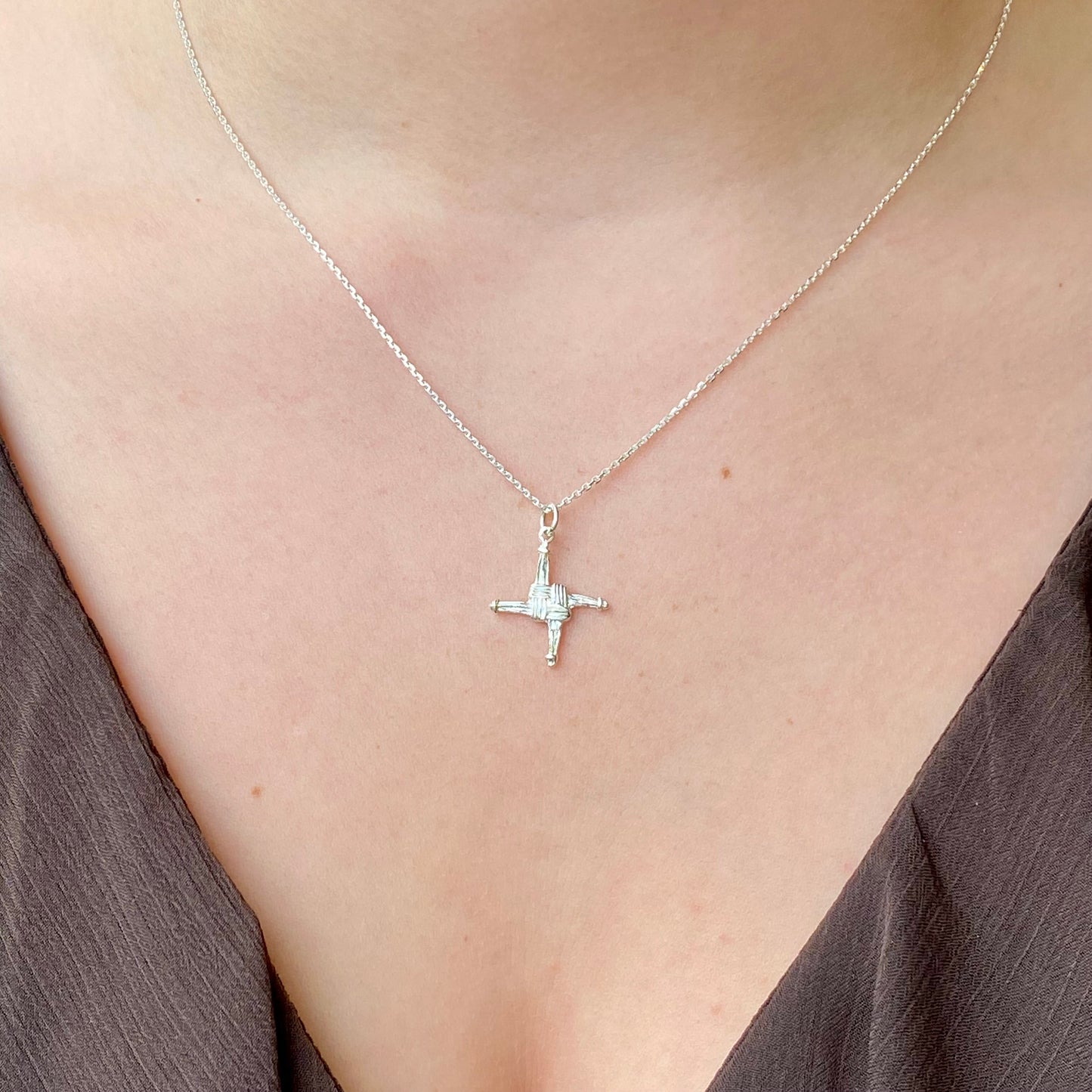 Silver St Bridget Cross Necklace by Clandela featuring an elegant cross pendant on a delicate chain.