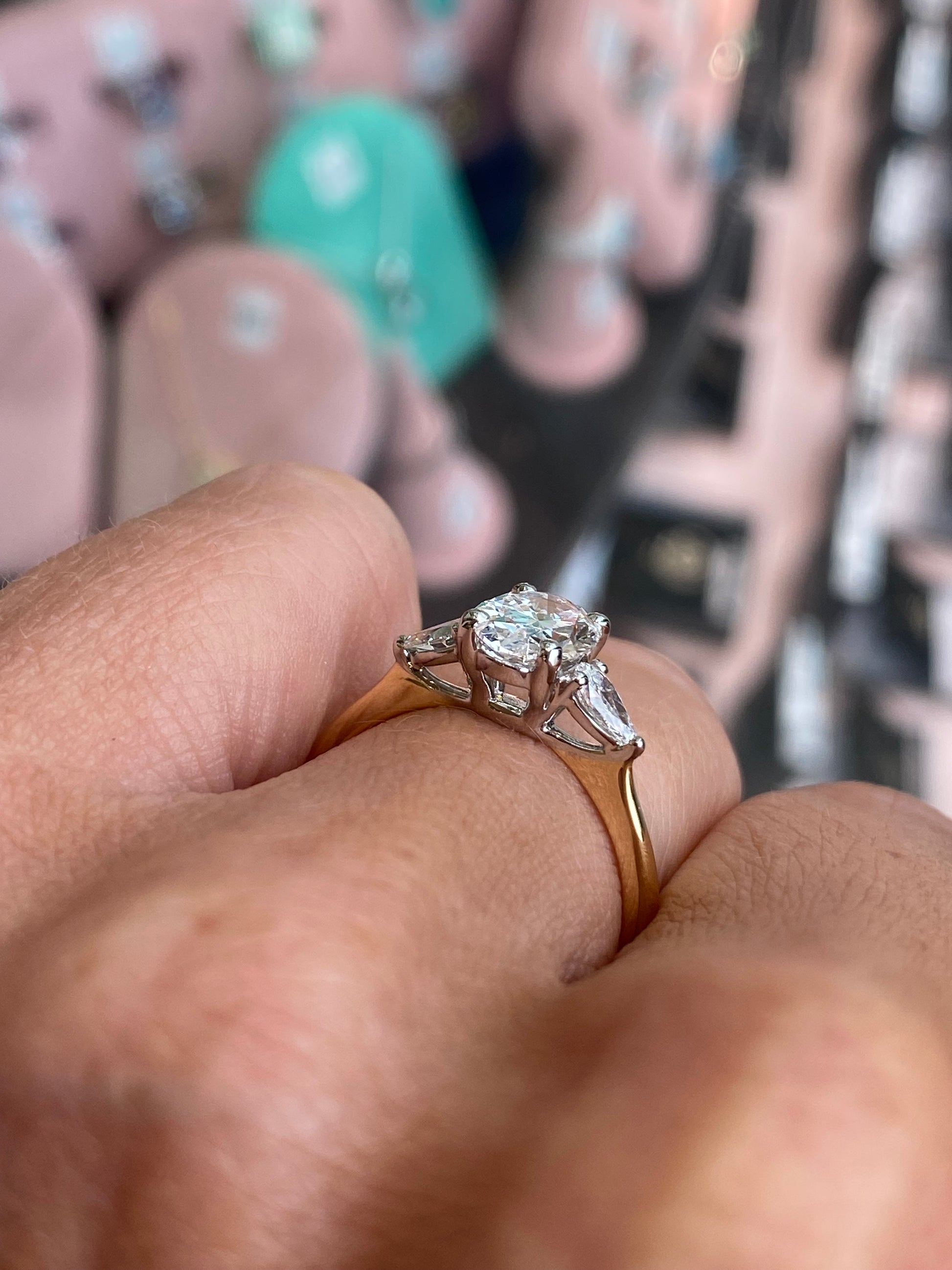 18ct gold trilogy engagement ring by Prima featuring a 1.61ct certified lab-grown diamond with three sparkling stones.