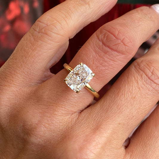 18ct gold radiant solitaire engagement ring with a 3.00ct lab-certified diamond by LMJ, featuring a classic and elegant design.