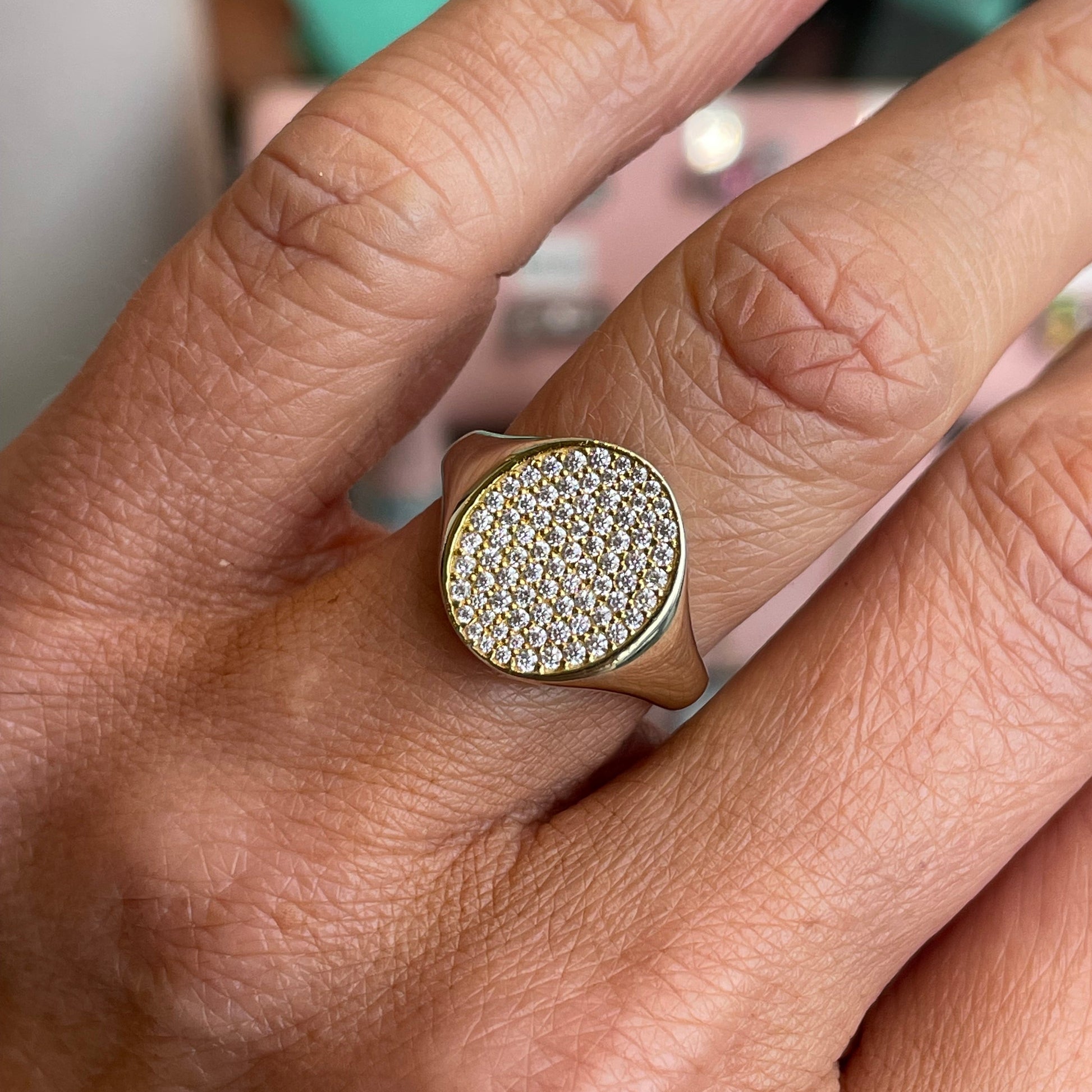 Sunshine CZ Chevalier ring by Comero featuring a sparkling cubic zirconia stone set in a sleek silver band.