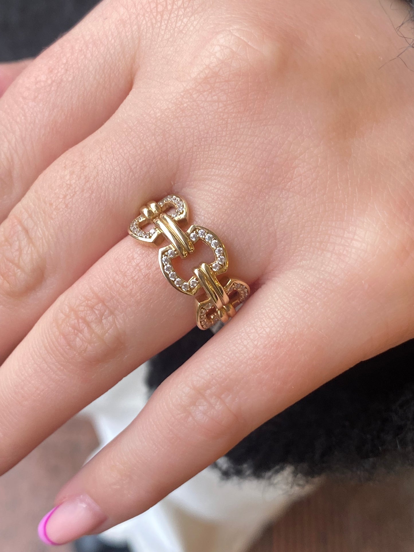 Comero Sunshine CZ Pretty Link Ring featuring a shimmering cubic zirconia design on a sleek silver band.