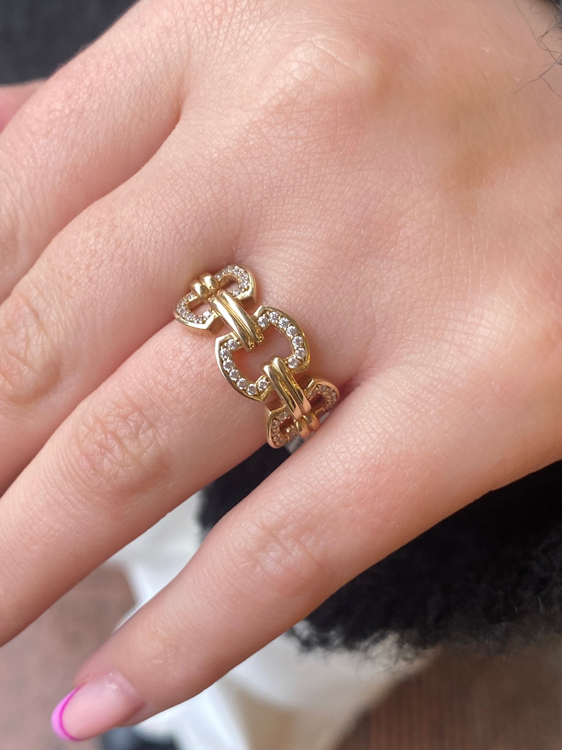 Comero Sunshine CZ Pretty Link Ring featuring a shimmering cubic zirconia design on a sleek silver band.