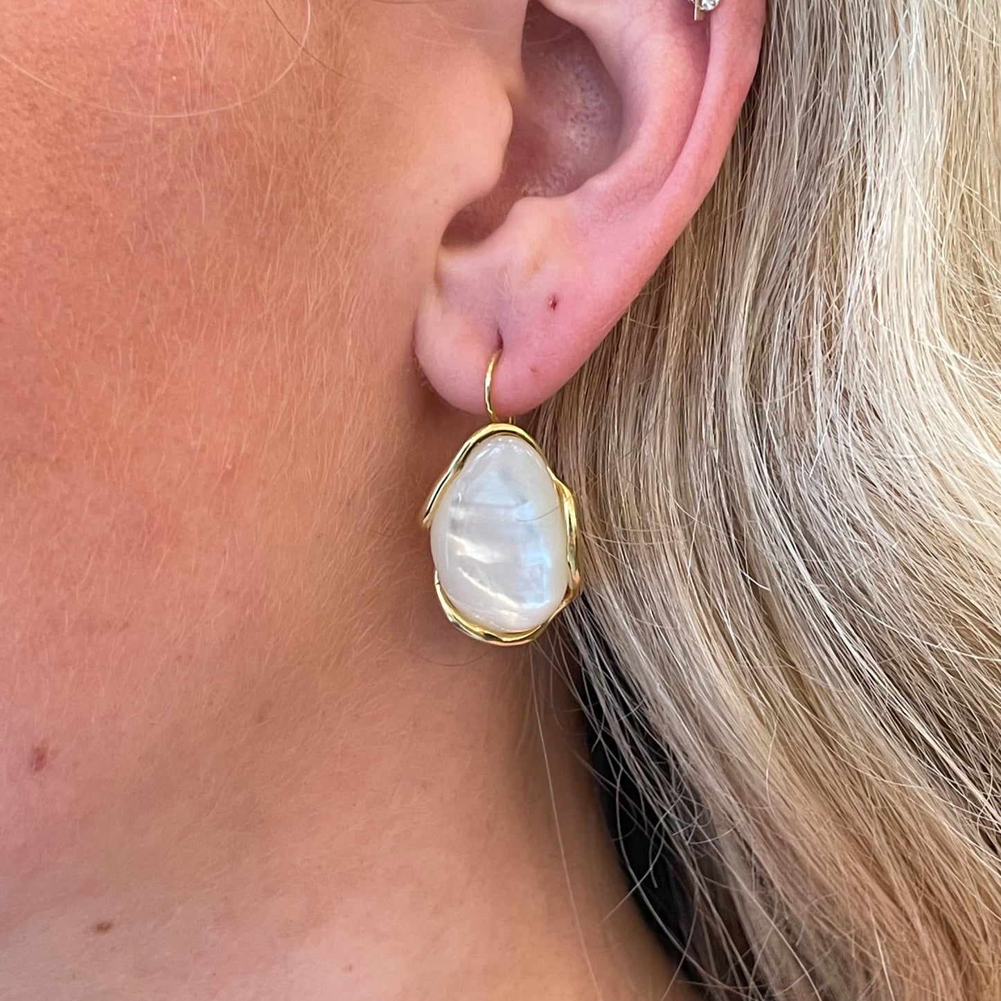Bruno mother of pearl drop earrings, 31mm x 17mm, featuring elegant iridescent pearl design with silver hooks.