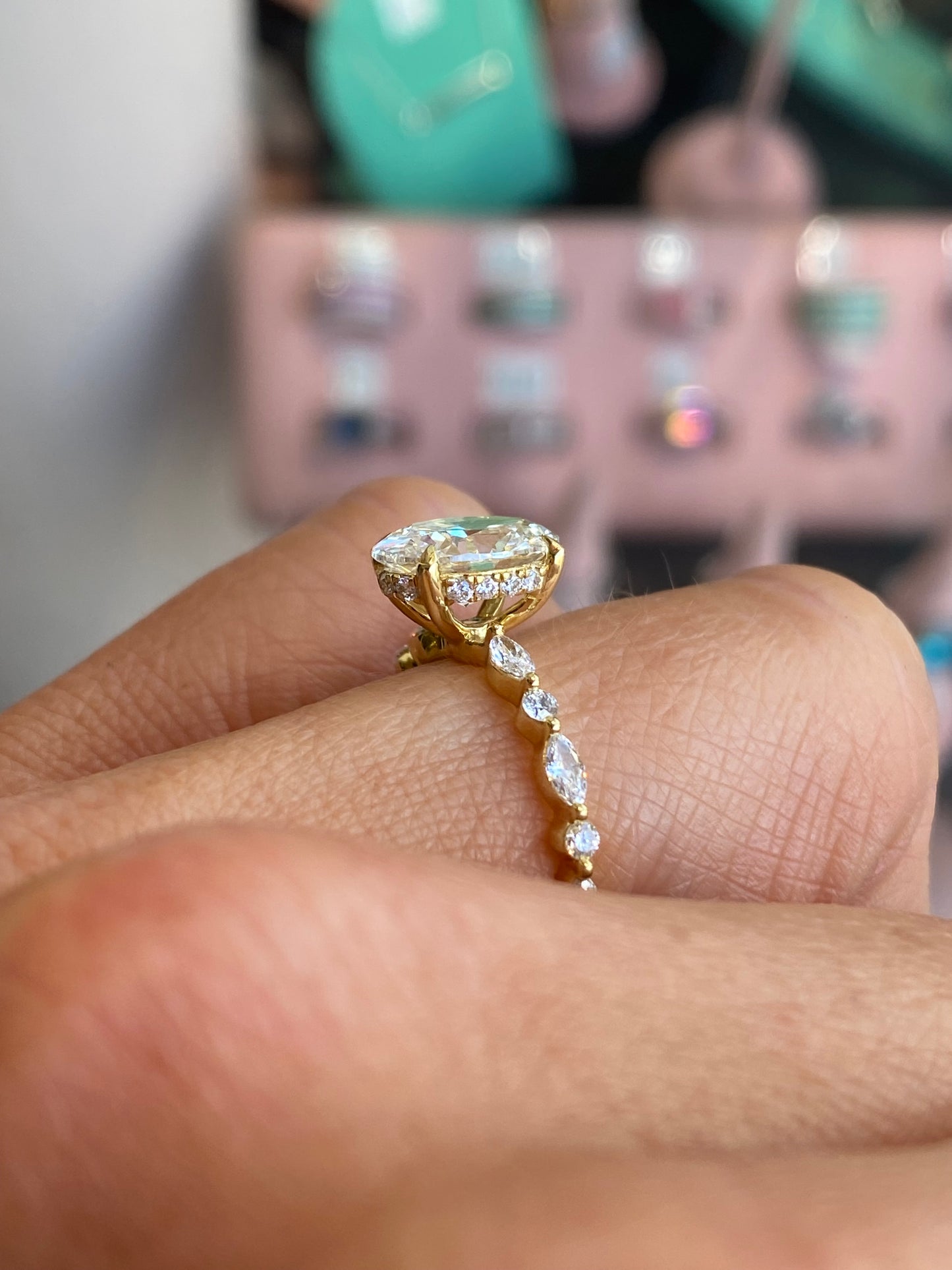18ct gold oval solitaire engagement ring with a 2.01ct certified lab-grown diamond by LMJ, showcasing a sleek, elegant design.